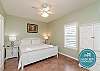Master bedroom with king size bed, private bathroom and flat screen TV