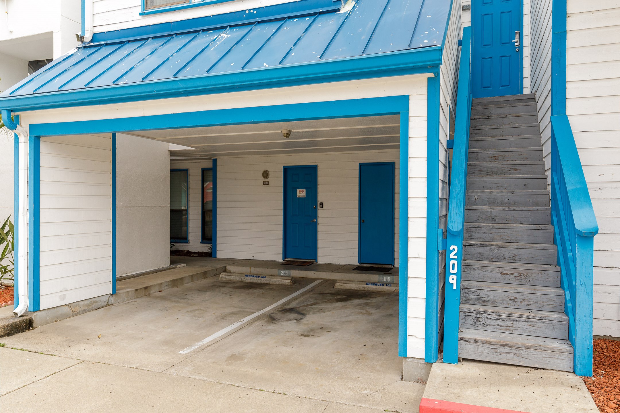 One reserved parking spot, #209