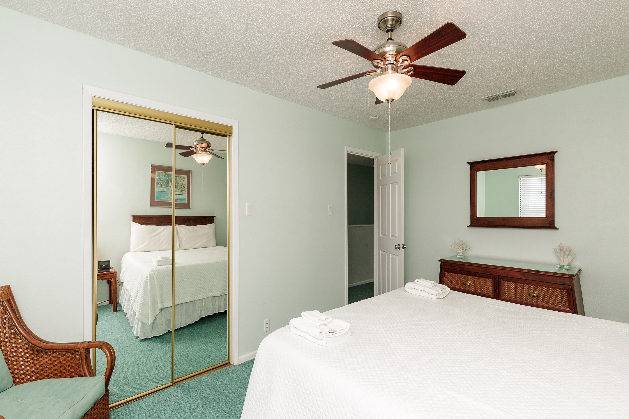Master bedroom on the second floor with king size bed and ensuite bathroom