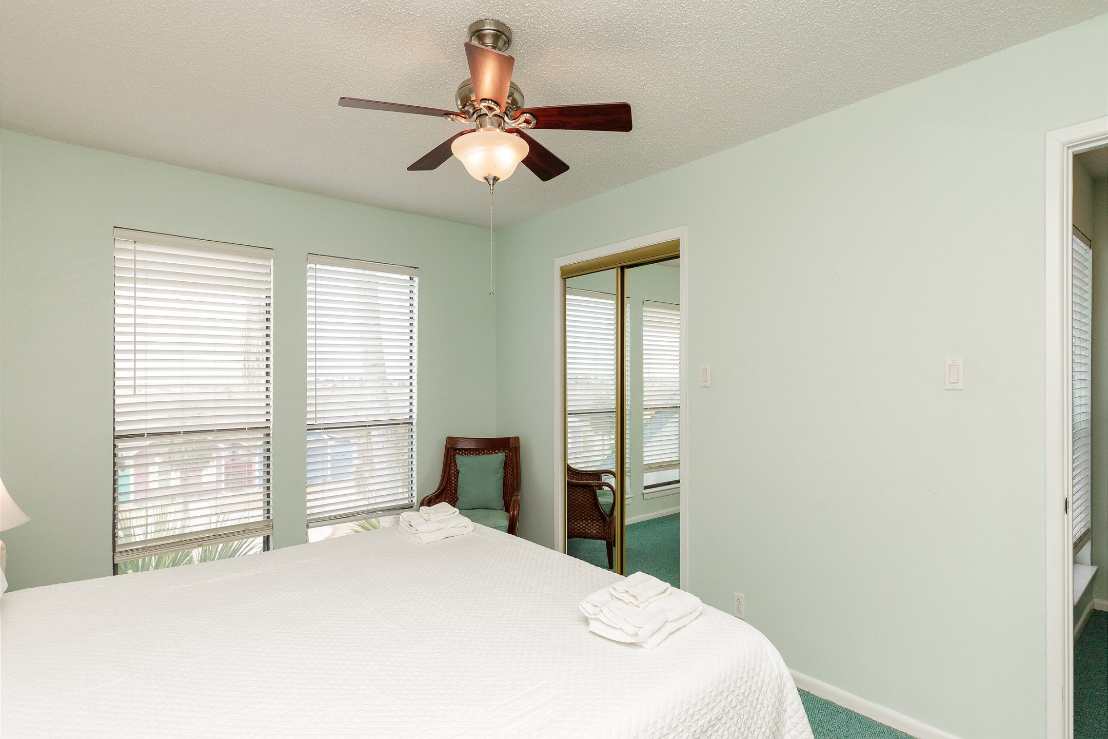 Master bedroom on the second floor with king size bed and ensuite bathroom