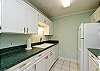 Kitchen area with plenty of storage and counter space to cook