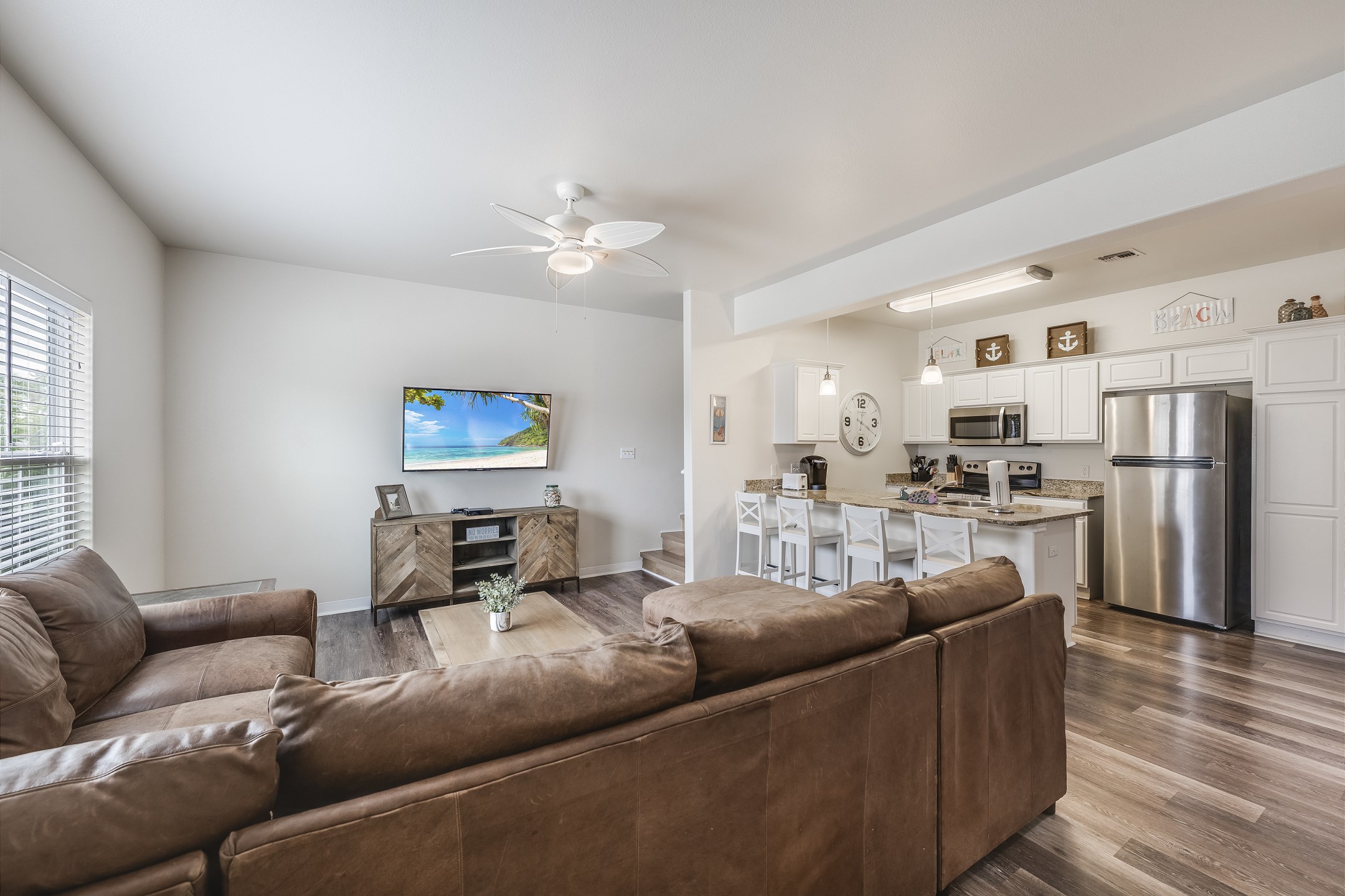 Seamless flow between living, dining, and kitchen areas - perfect for entertaining