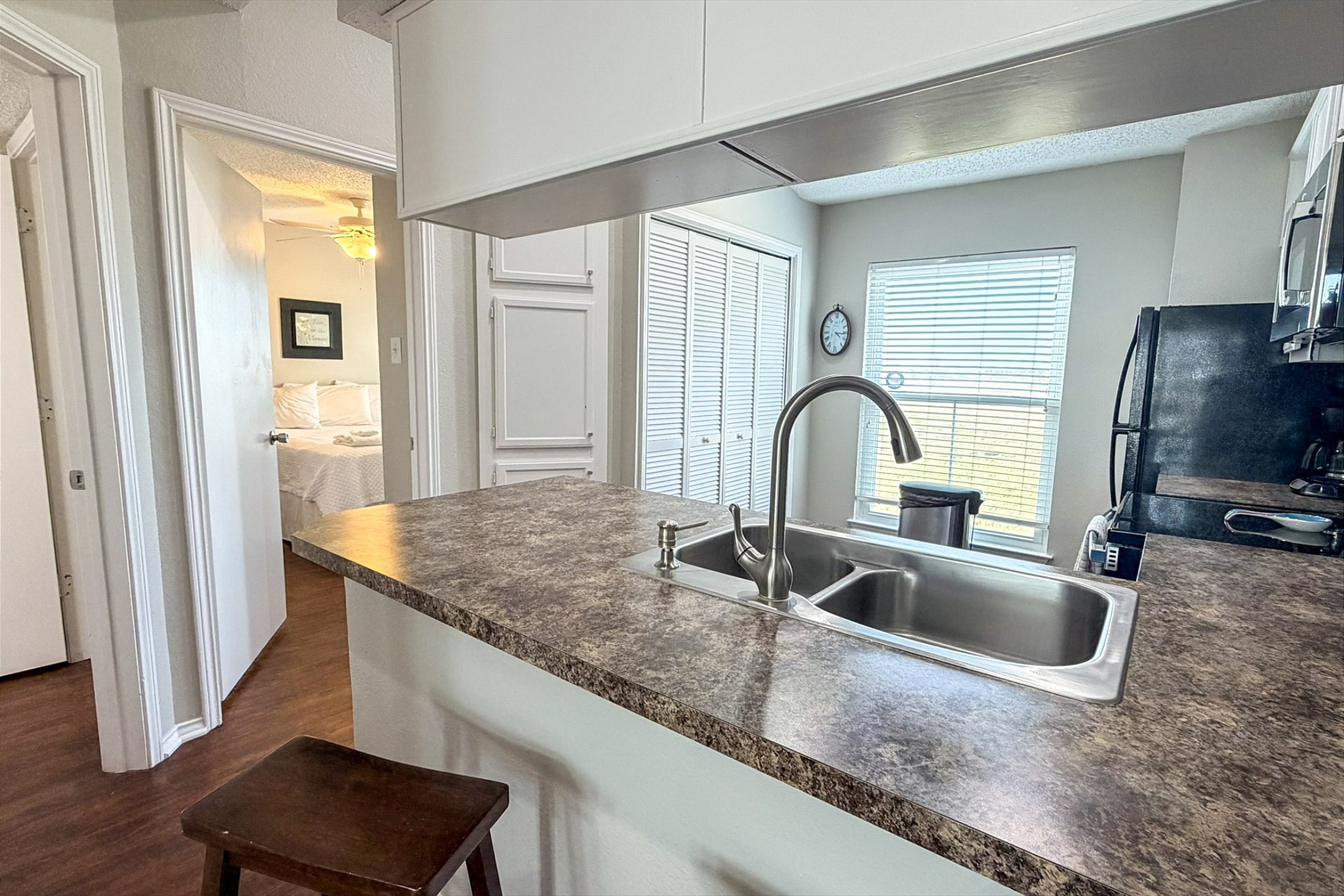Charming breakfast bar to chill and chat it up while prepping dinner