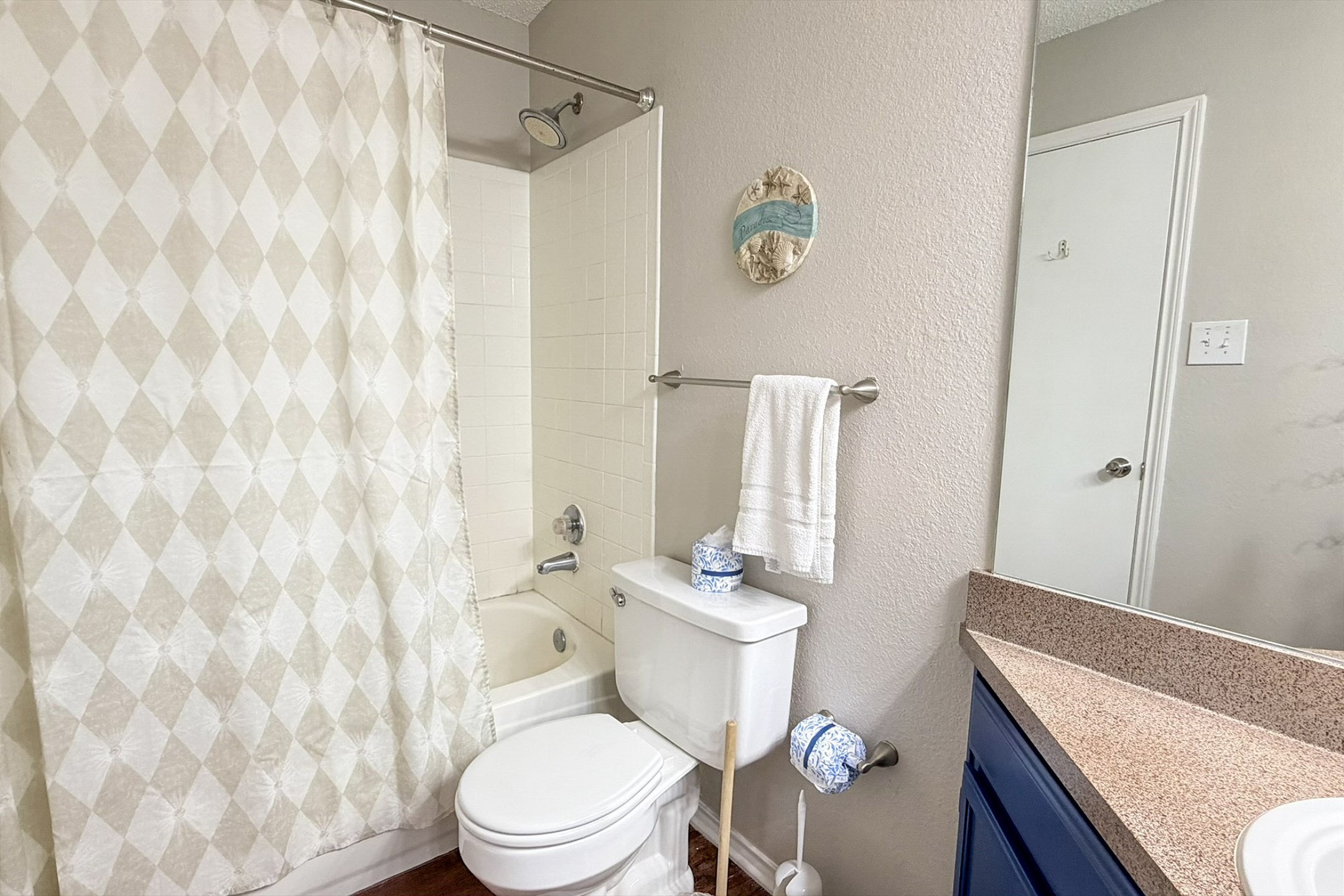 Master bathroom with tub/shower combo and fresh paint