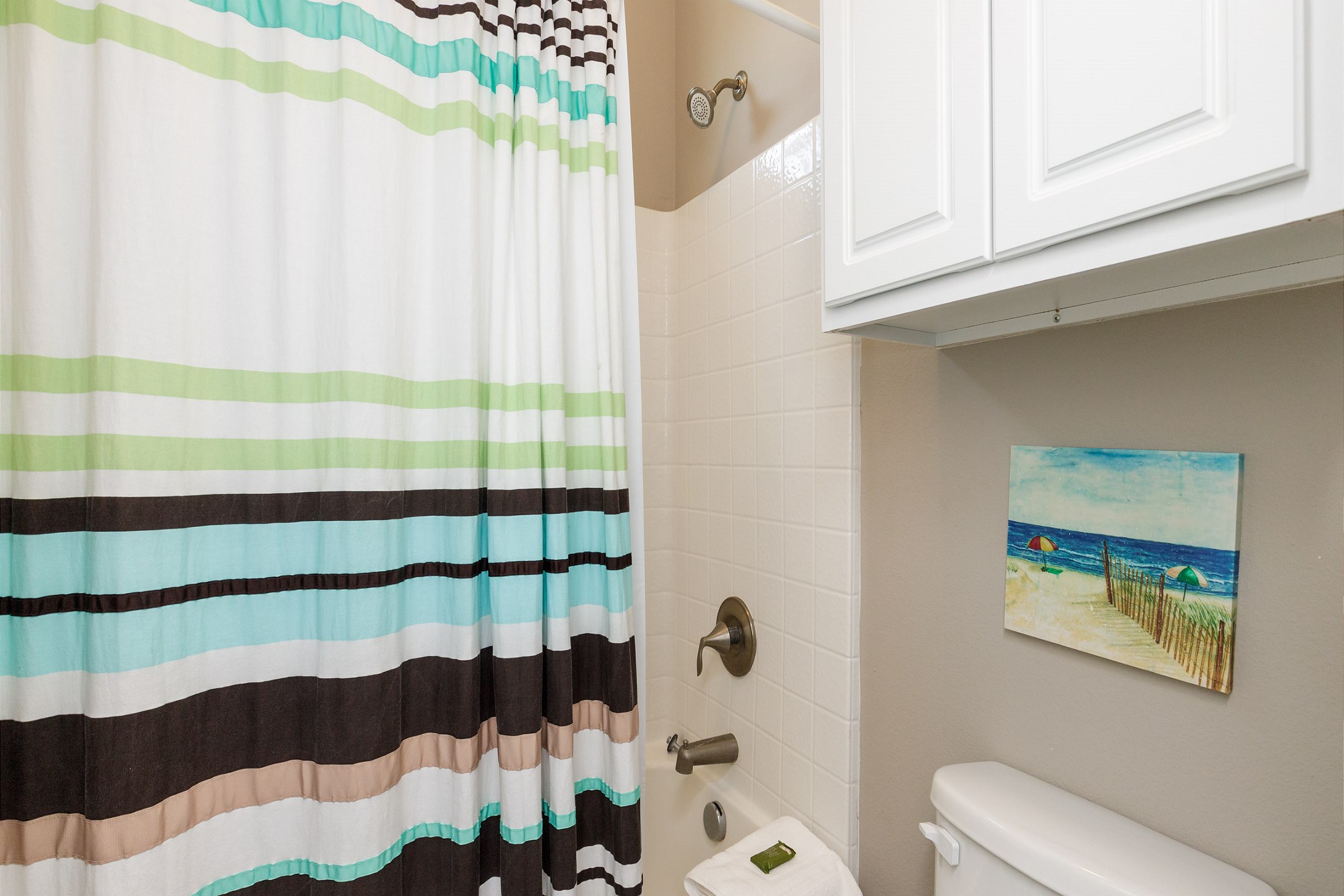 Guest bathroom on the second floor with tub and shower 