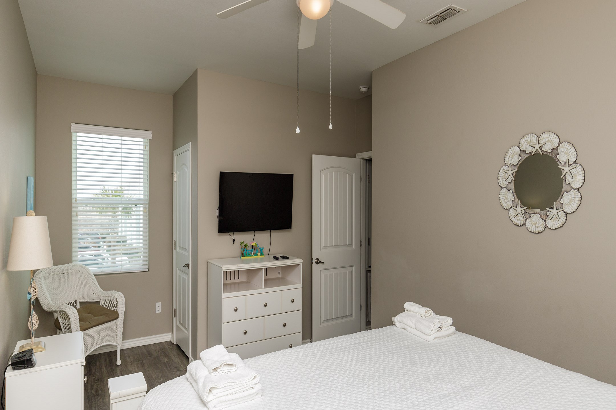 Guest bedroom on the second floor with a king size bed