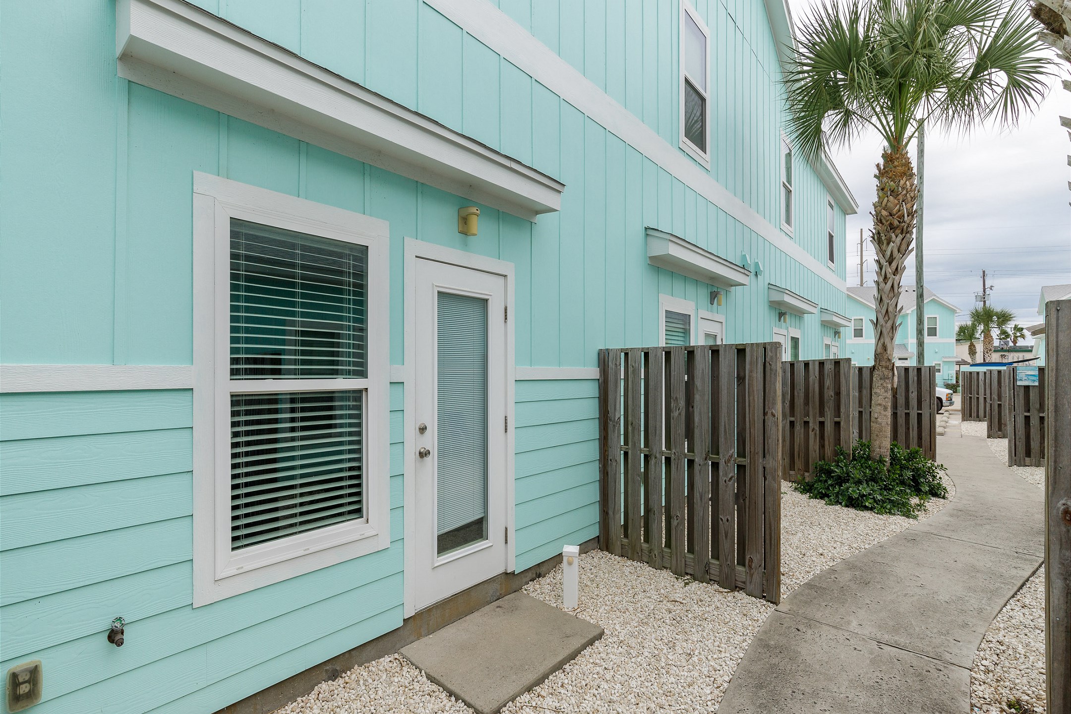 Back patio with easy access to the pool area located at the rear of the complex