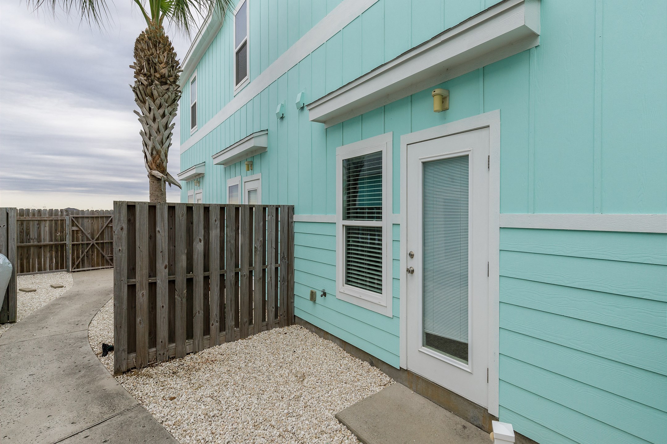 Back patio with easy access to the pool area located at the rear of the complex