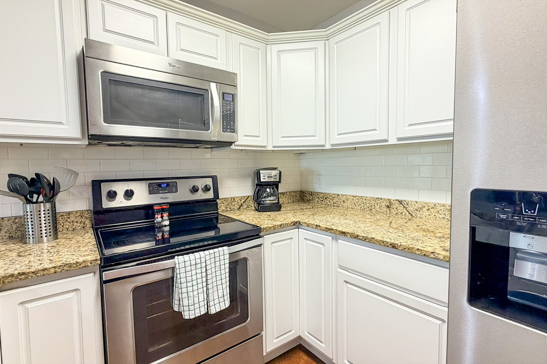 Fully equipped vacation rental kitchen with stainless steel appliances and everything you need