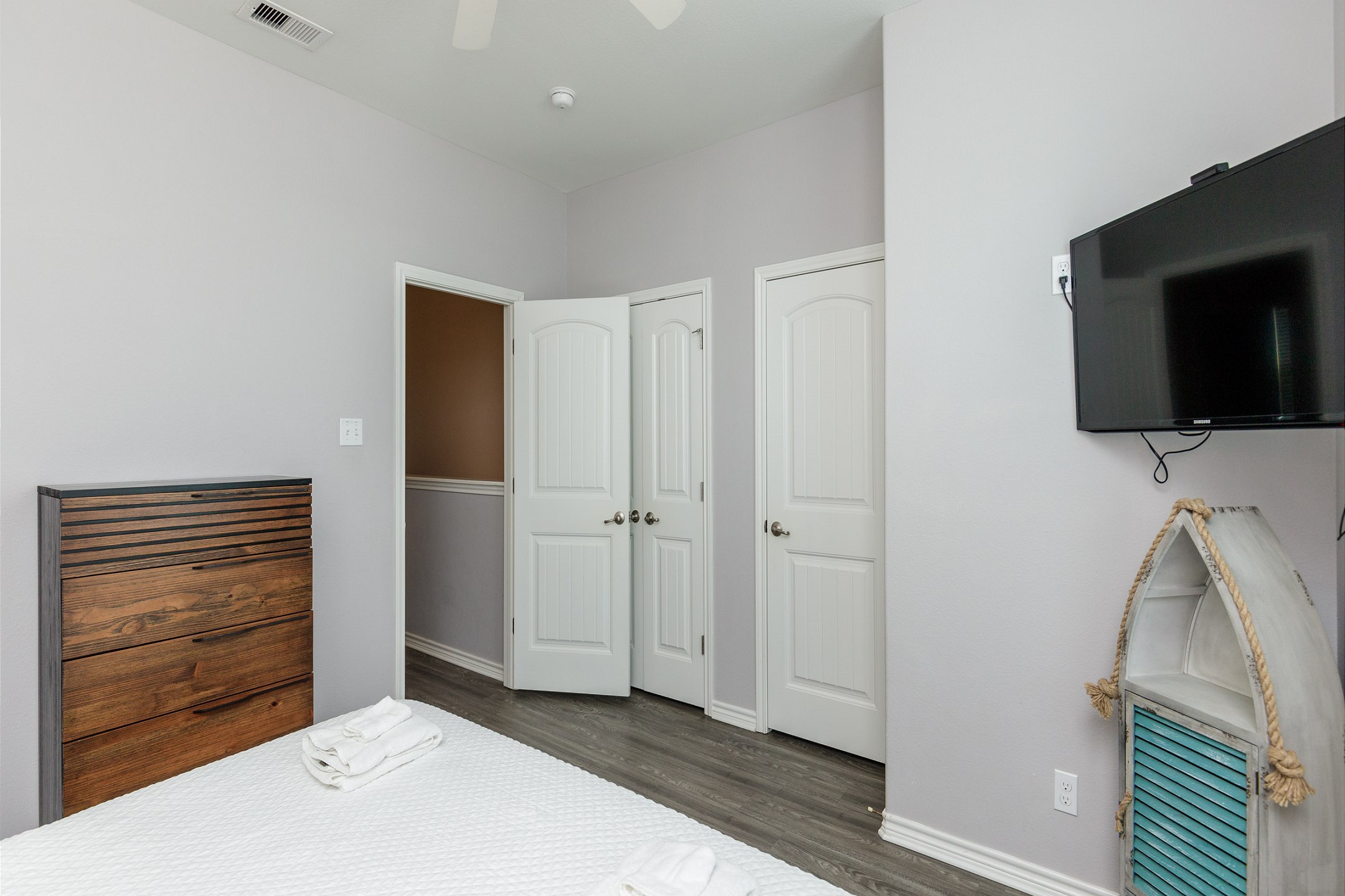 Second bedroom on the second floor with king size bed, private bathroom and flat screen TV