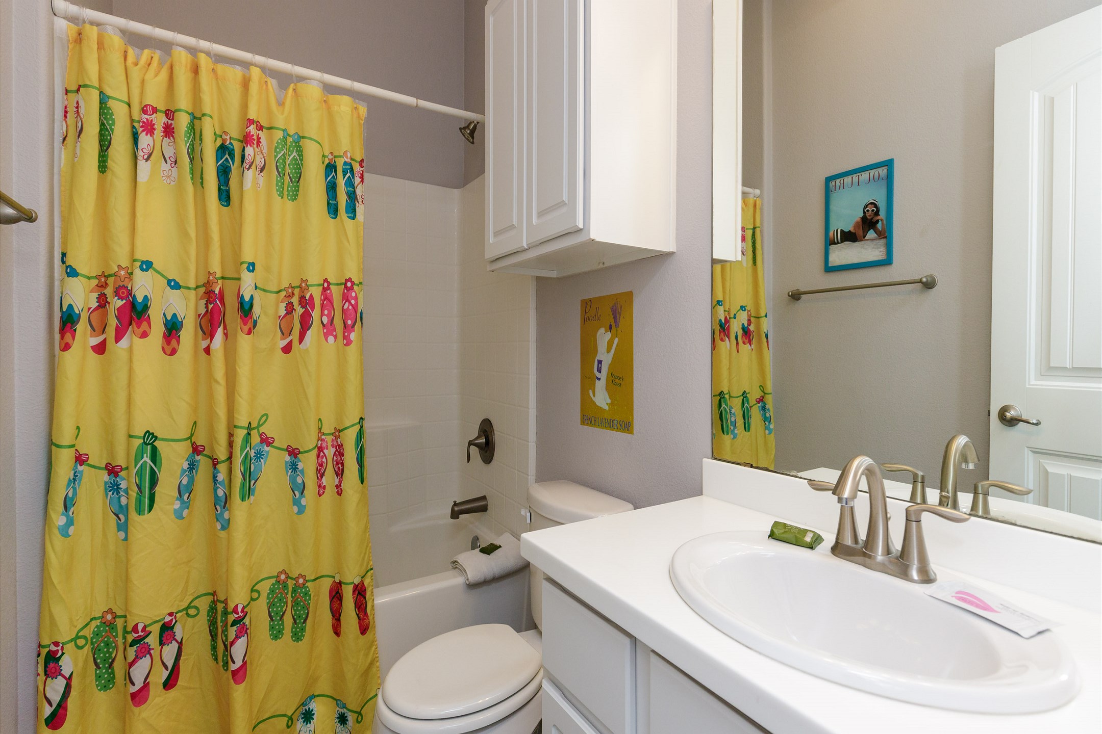 Private bathroom off the second bedroom with tub/shower combo