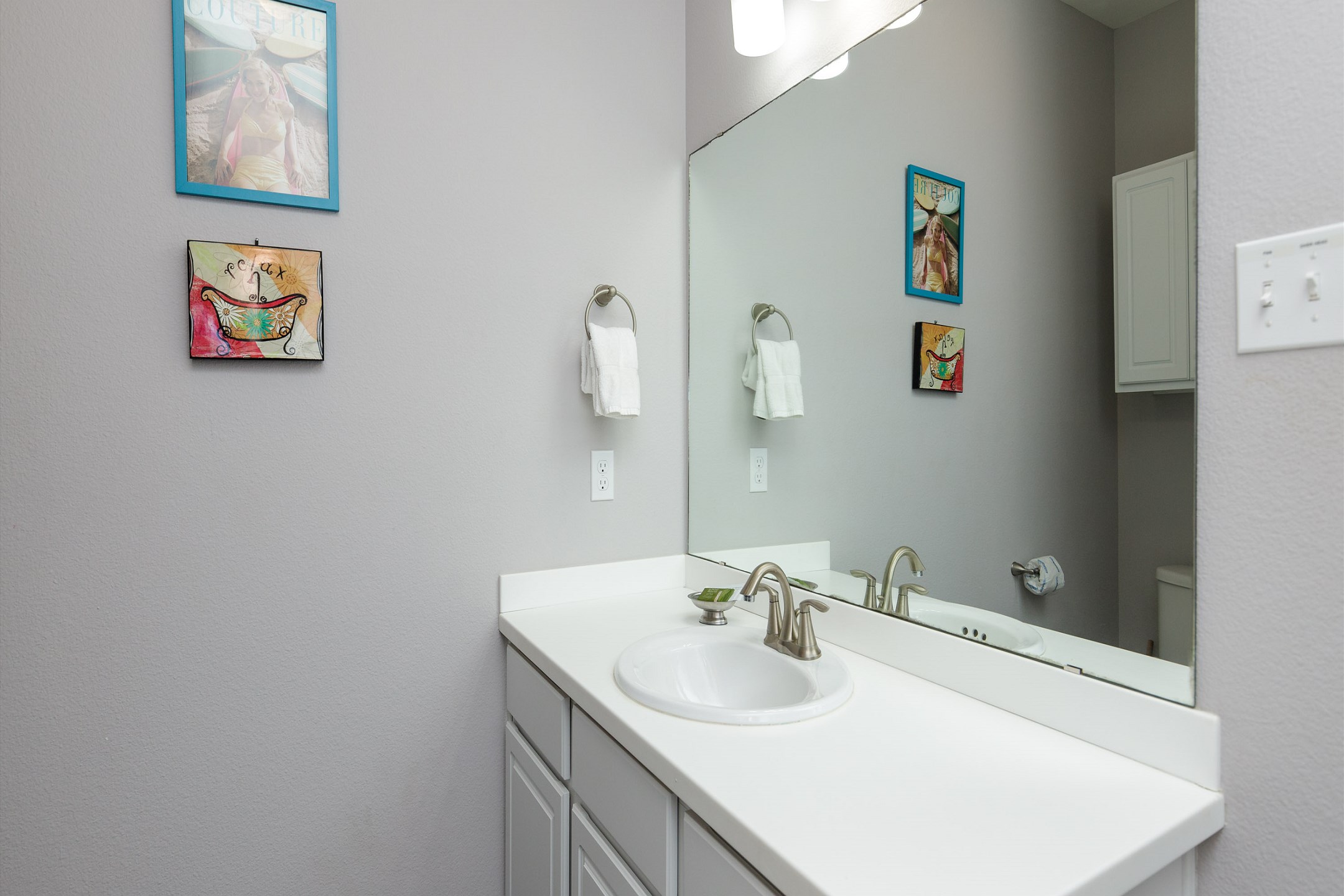 Private bathroom off the third bedroom with walk in shower 