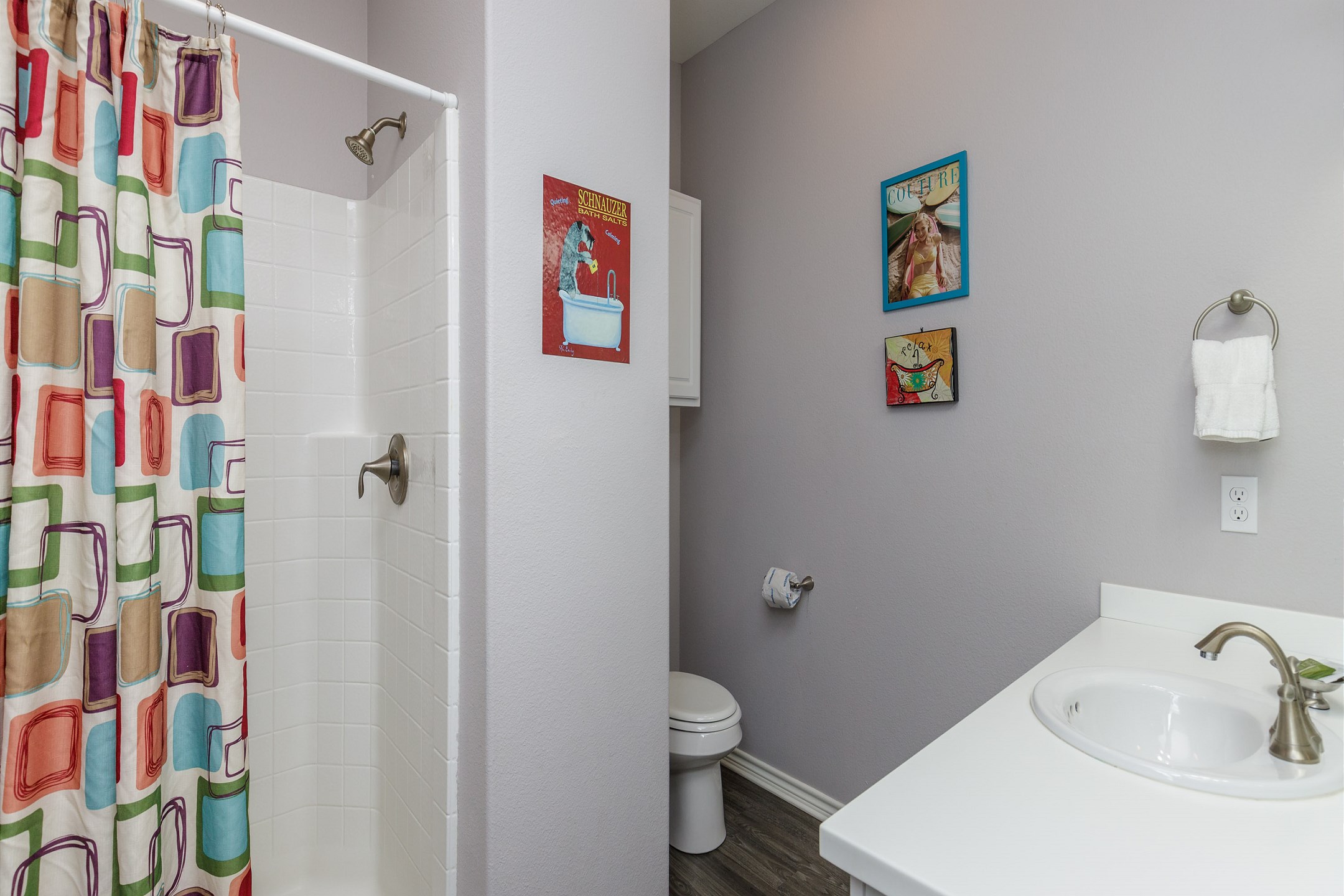 Private bathroom off the third bedroom with walk in shower 