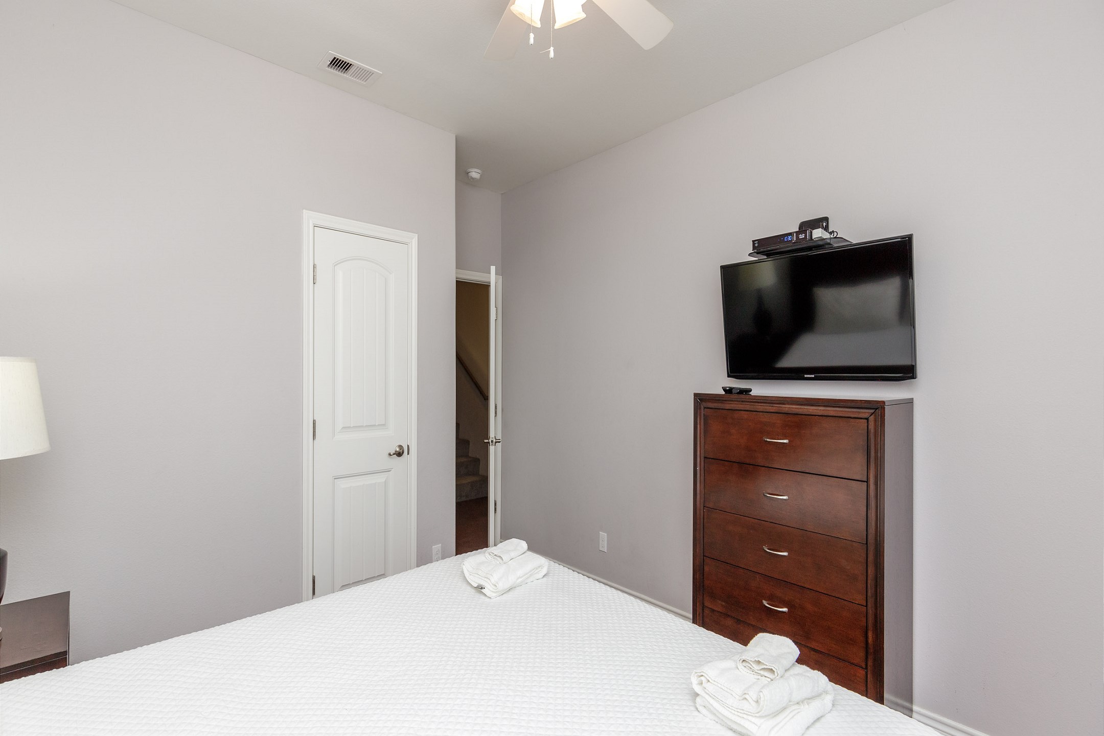 Master bedroom on the first floor with king size bed and flat screen TV