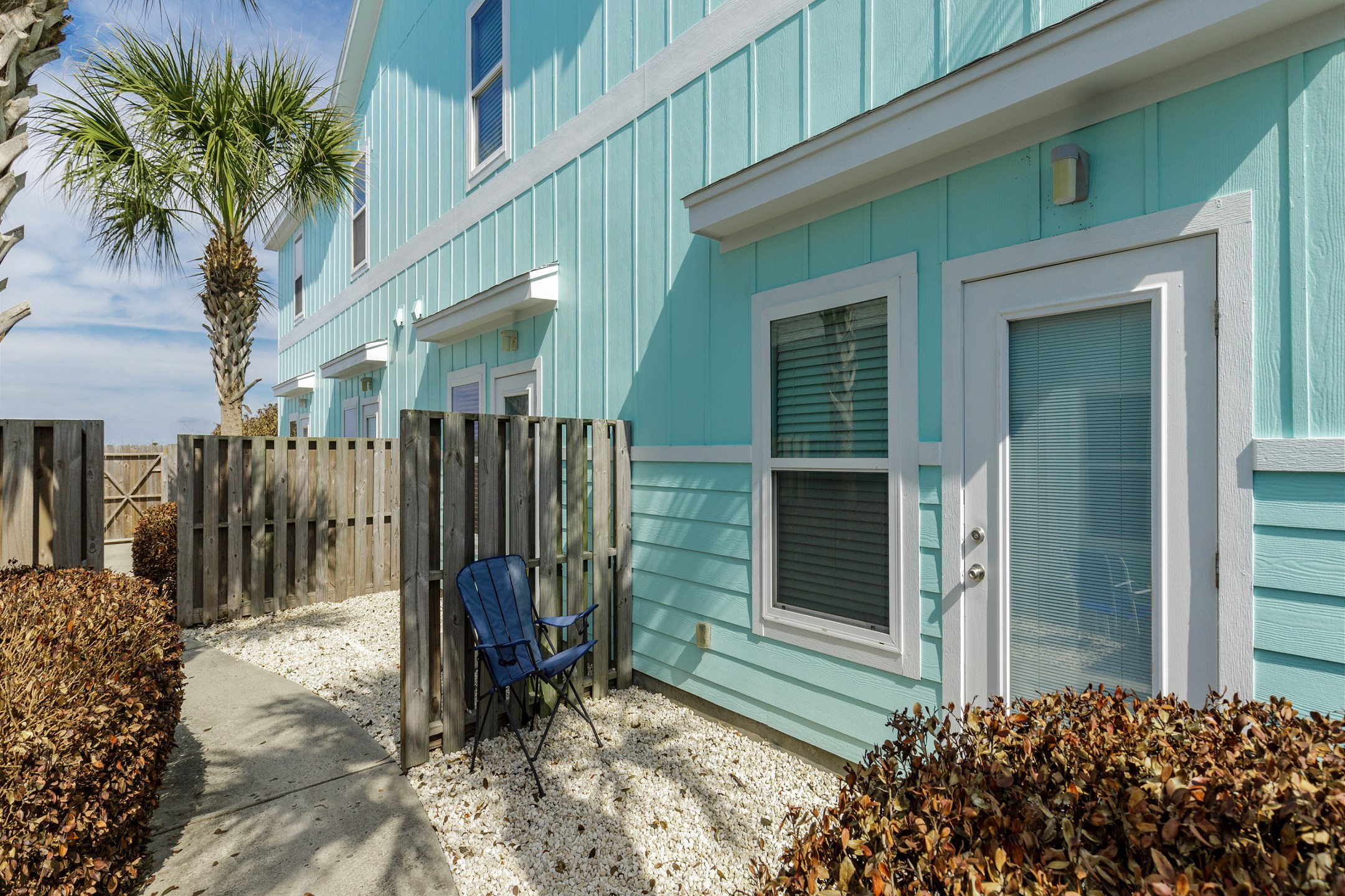 Back patio with easy access to the pool area located at the rear of the complex