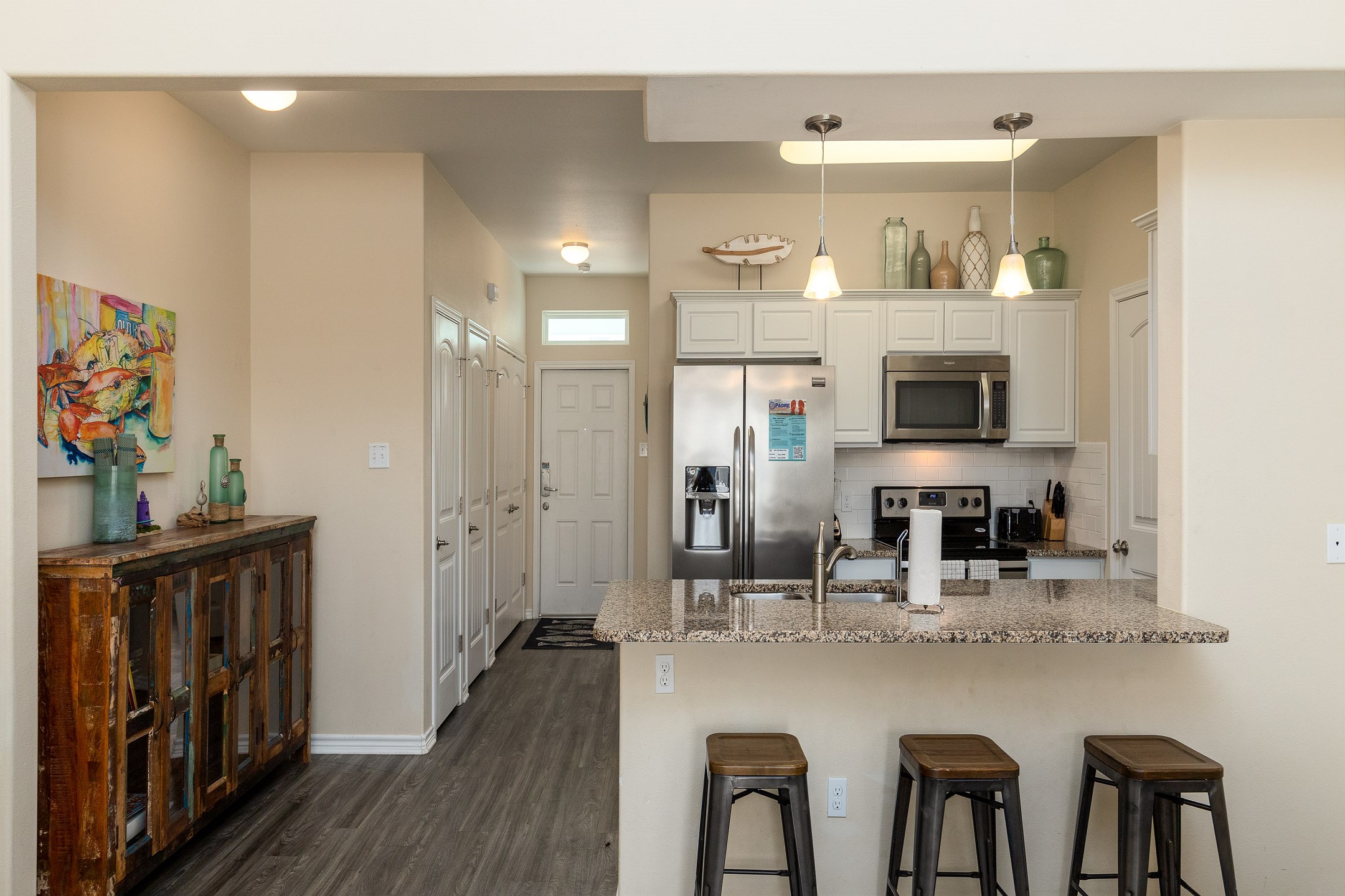 The kitchen is ideal for quick snacks or culinary creations during your stay