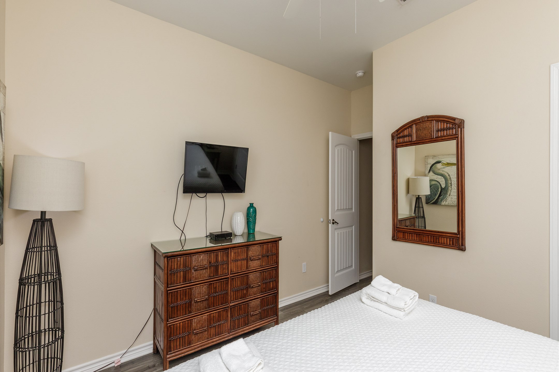 Second bedroom on the second floor with a king size bed and flat screen TV