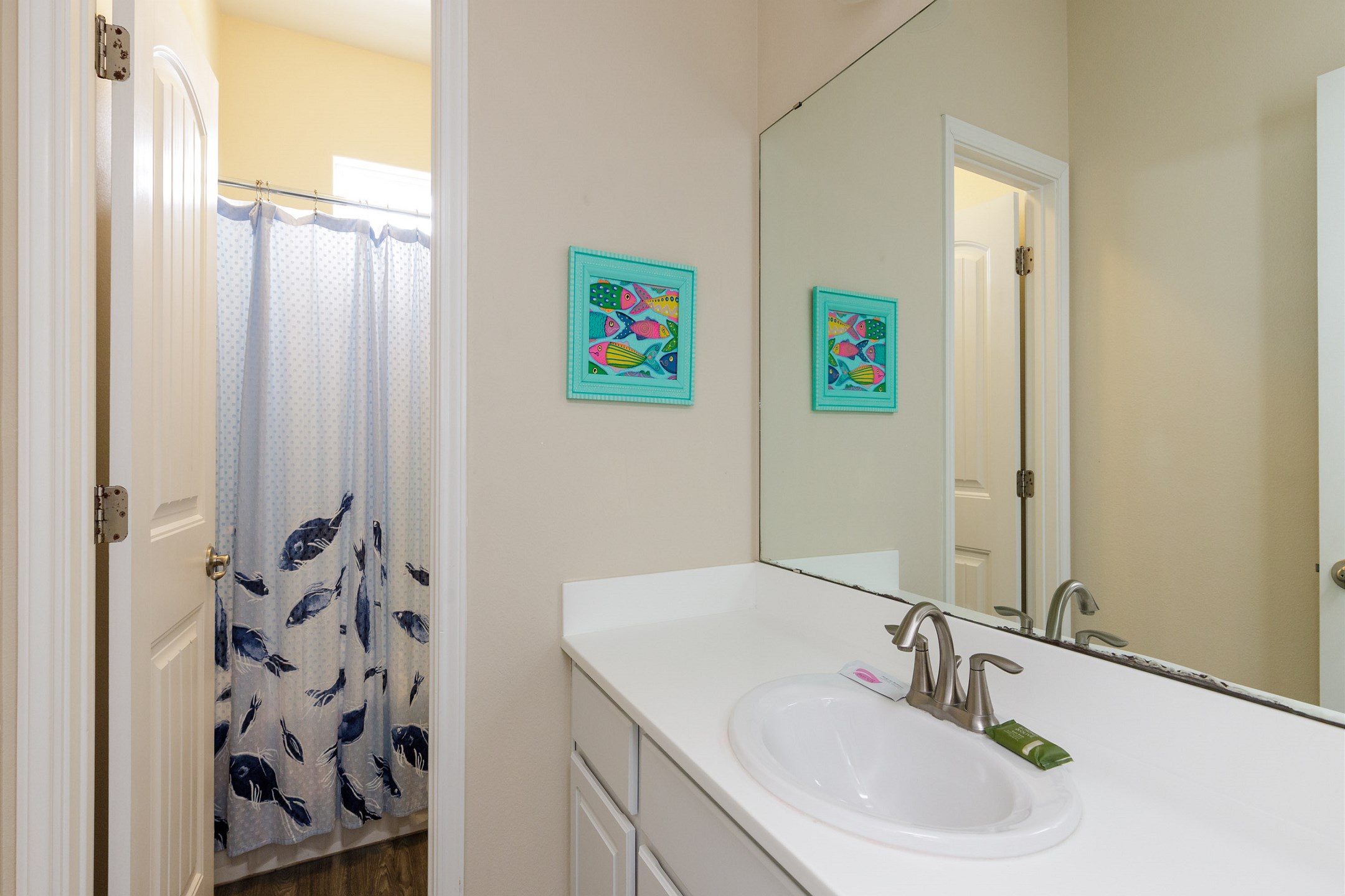 Guest bathroom on the second floor with tub and shower combo