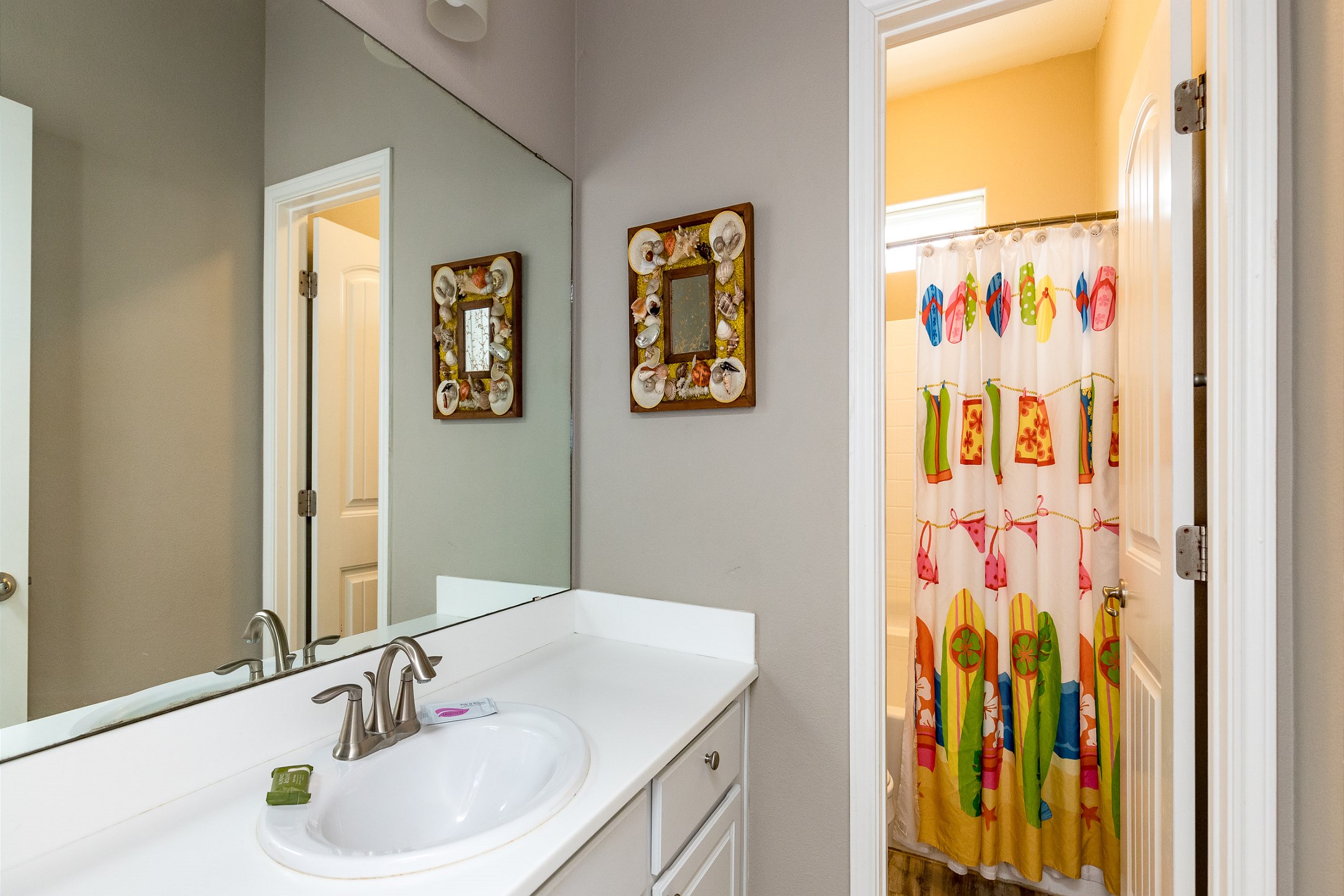 Guest bathroom on the second floor with tub and shower 
