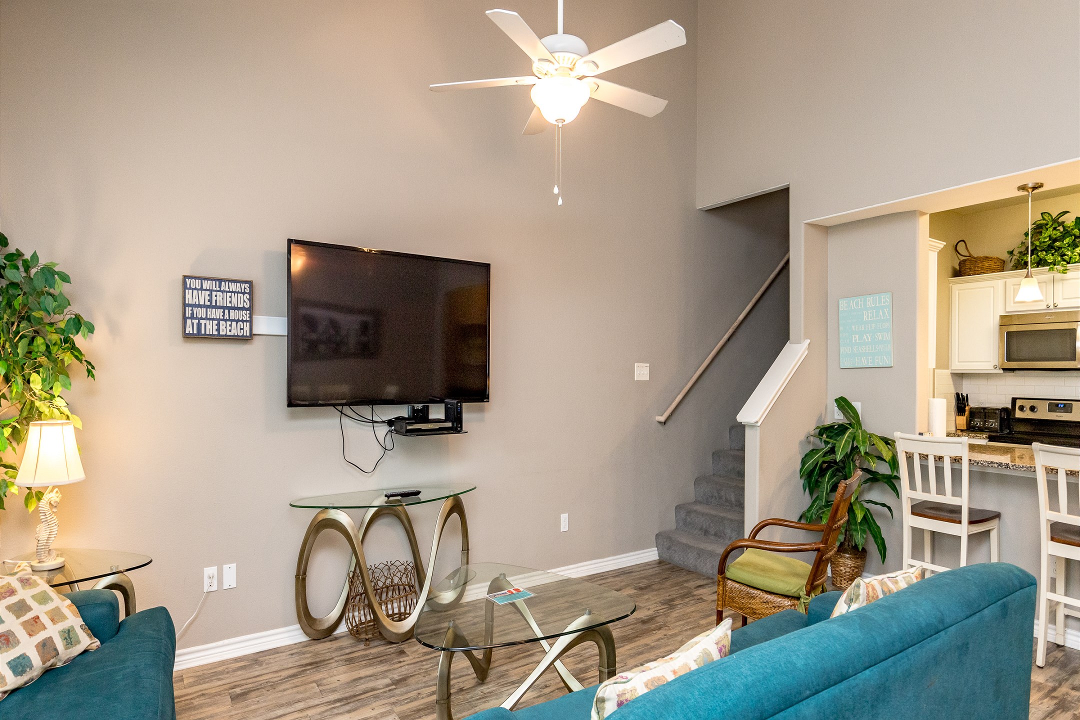 Modern entertainment haven boasting a state-of-the-art flat-screen TV, streaming services, and comfortable lounging options for movie nights
