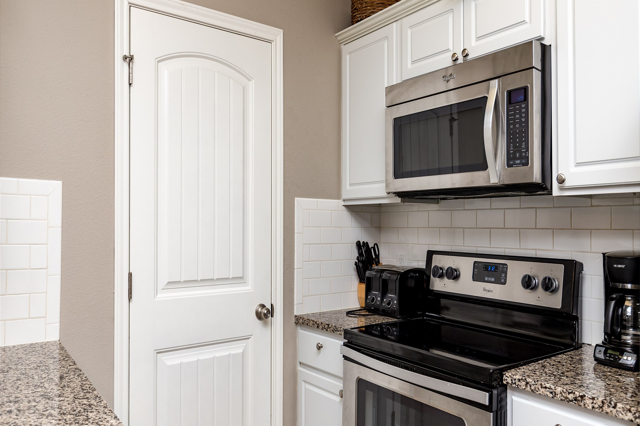 Fully equipped kitchen with updated appliances 