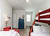 Third bedroom on the second floor with twin over full size bunk bed, twin size bed, and full size futon 