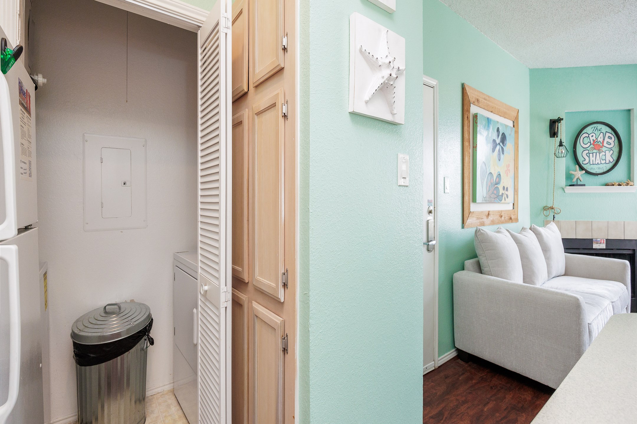 Kitchen area with washer and dryer 