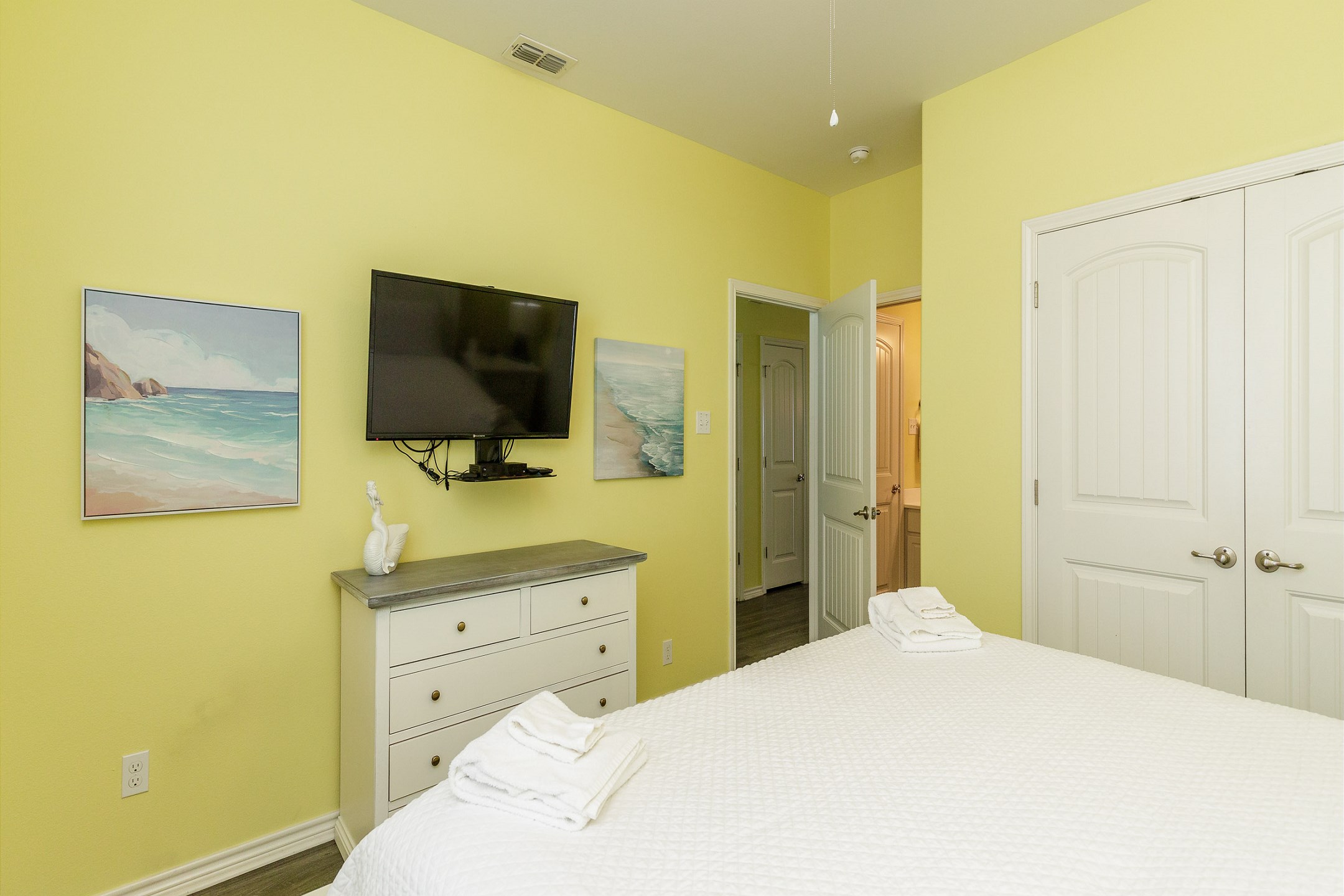 Sleep soundly in the first floor primary bedroom with a king-size bed