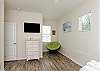 Third bedroom on the second floor with flat screen TV