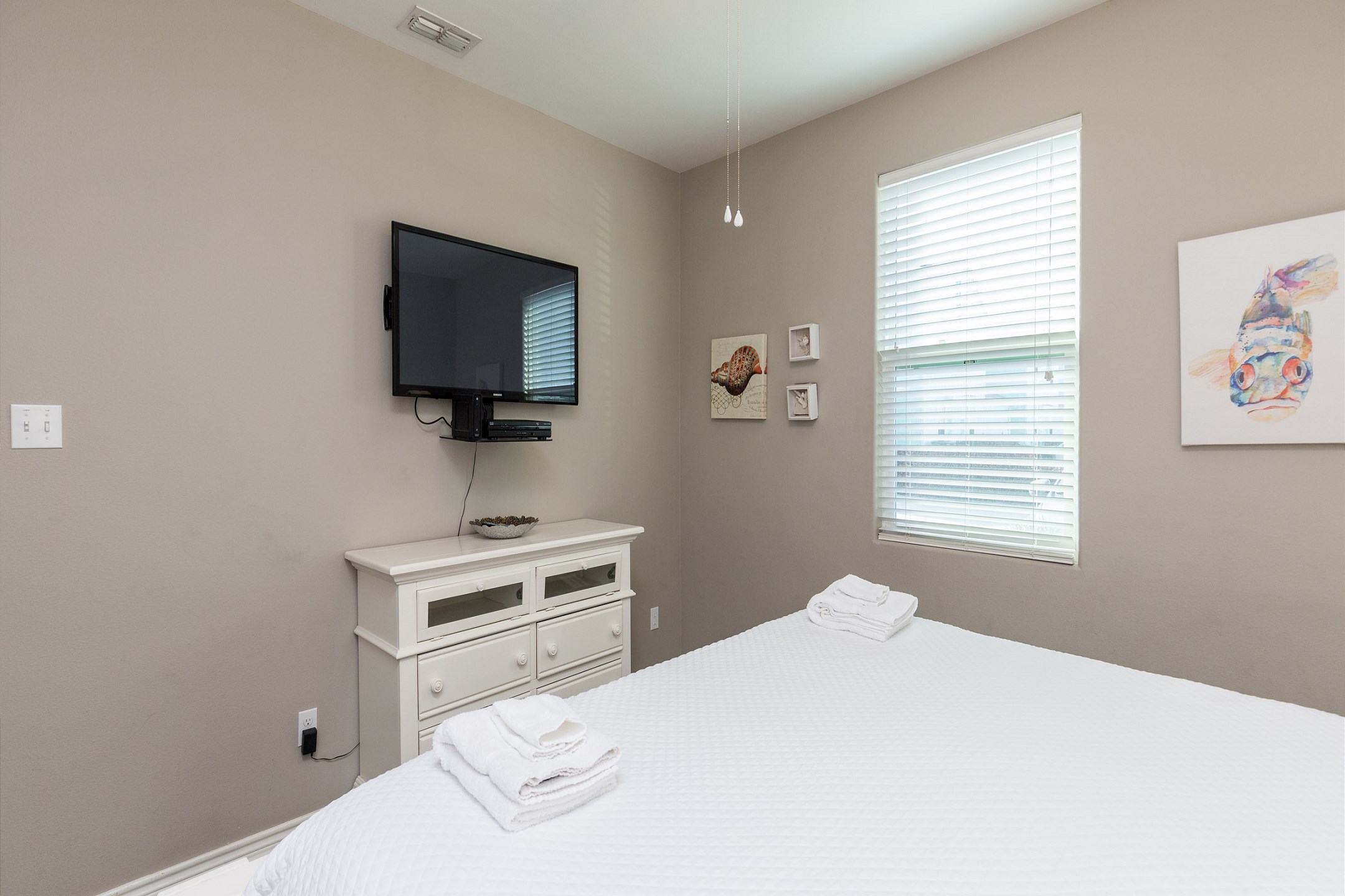 Master bedroom on the first floor with king size bed and flat screen TV 