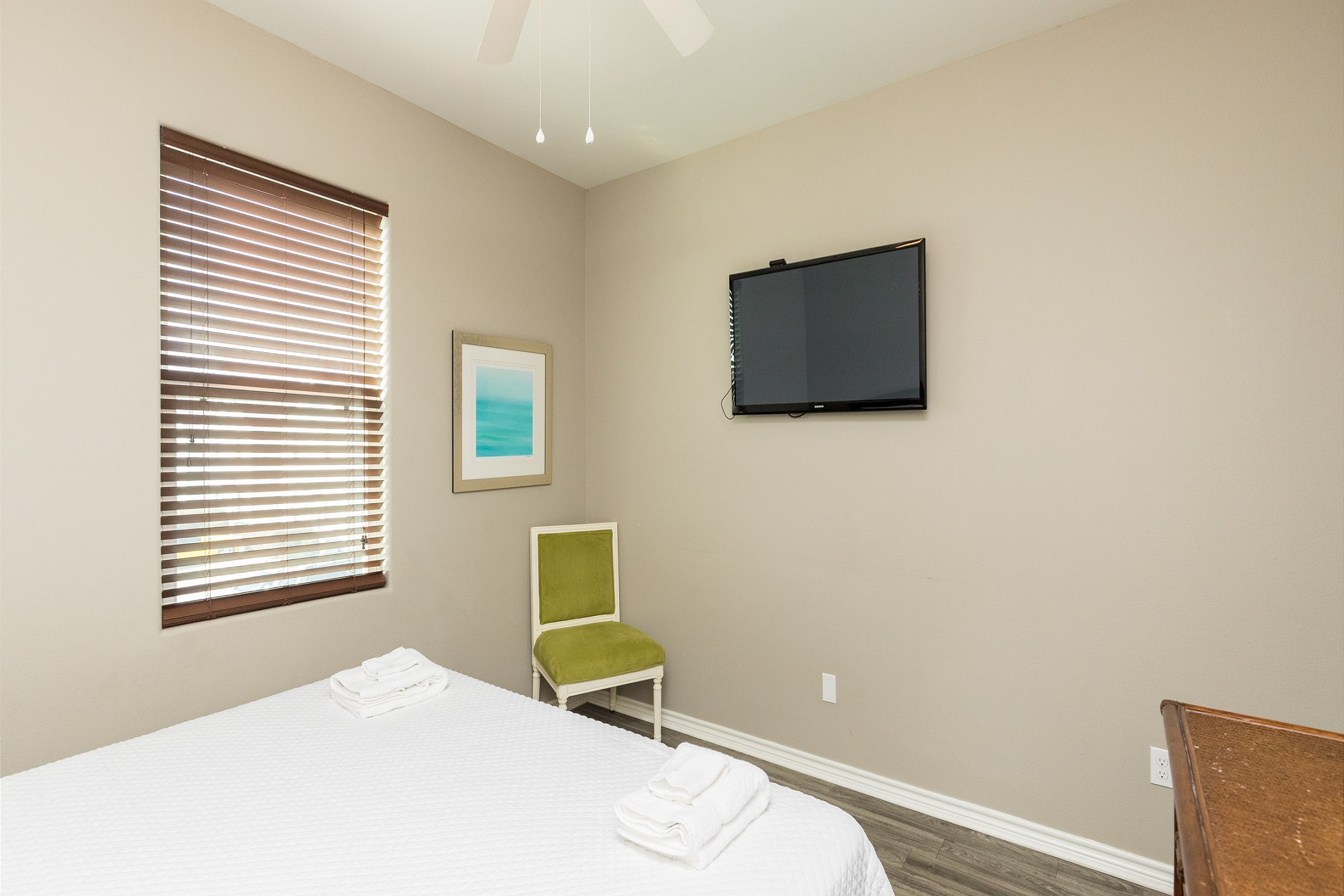 Second bedroom on the second floor with king size bed and flat screen TV