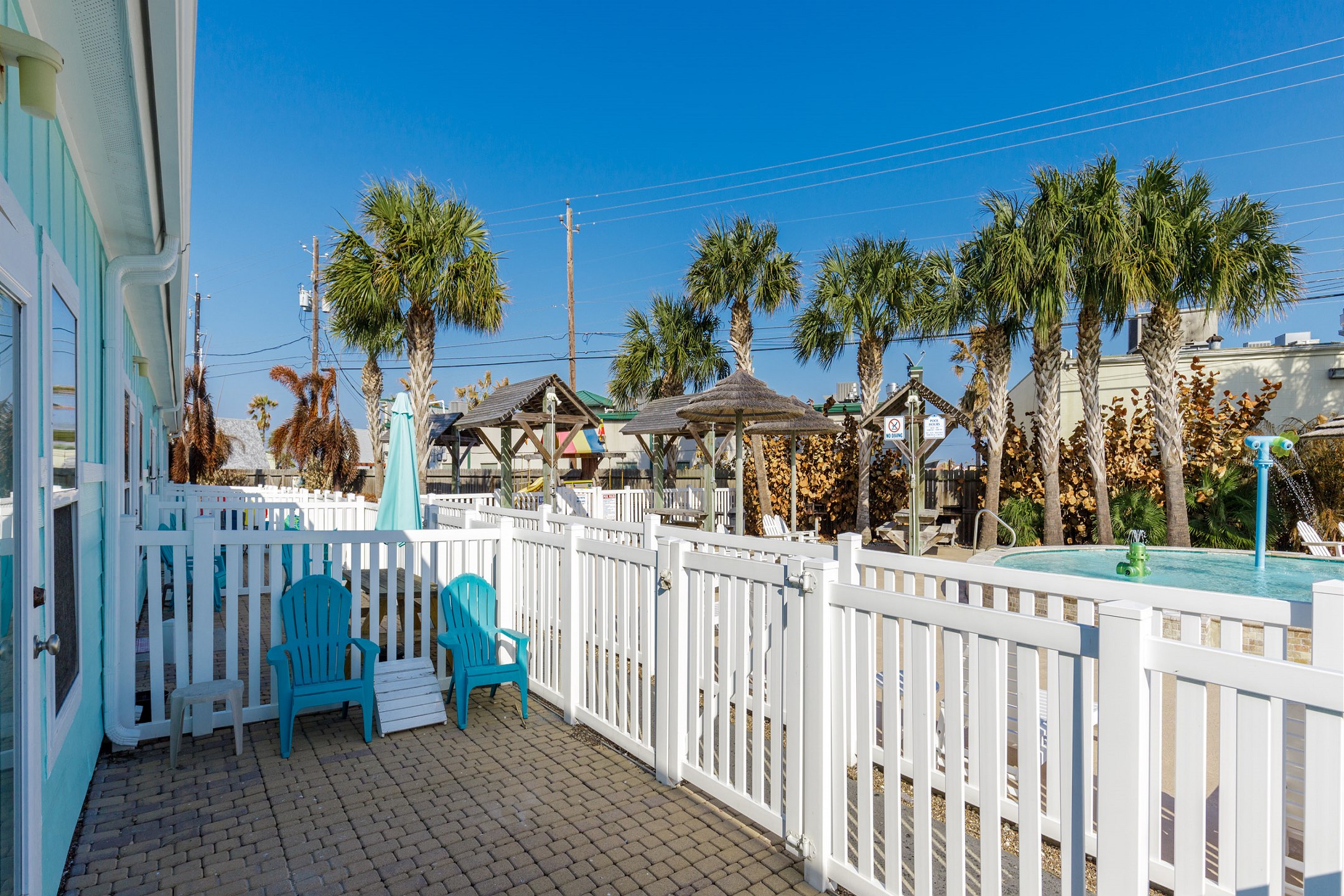 Patio over-looking the playground and pool area 