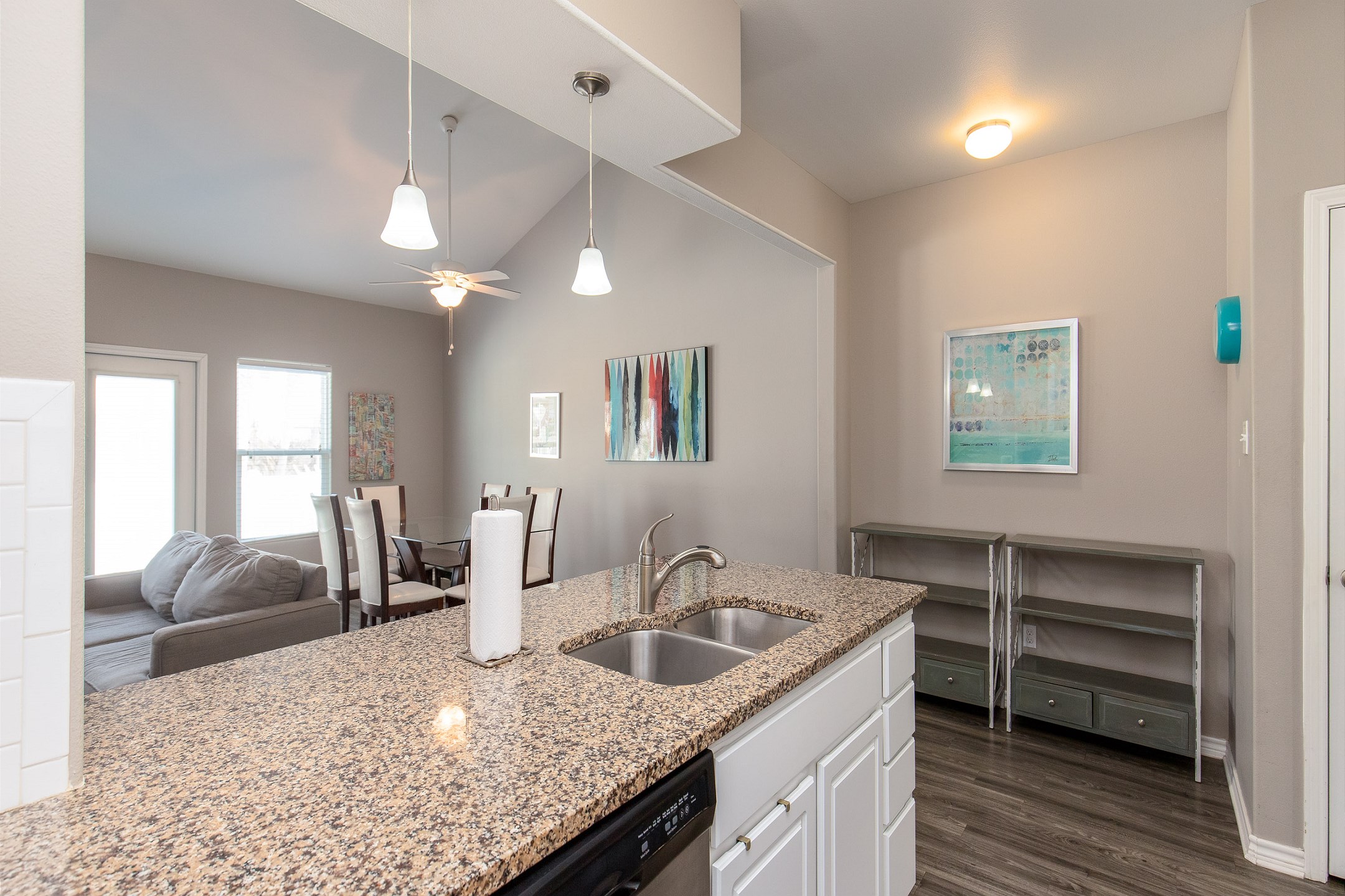 Open-concept layout connecting the dining area to the kitchen