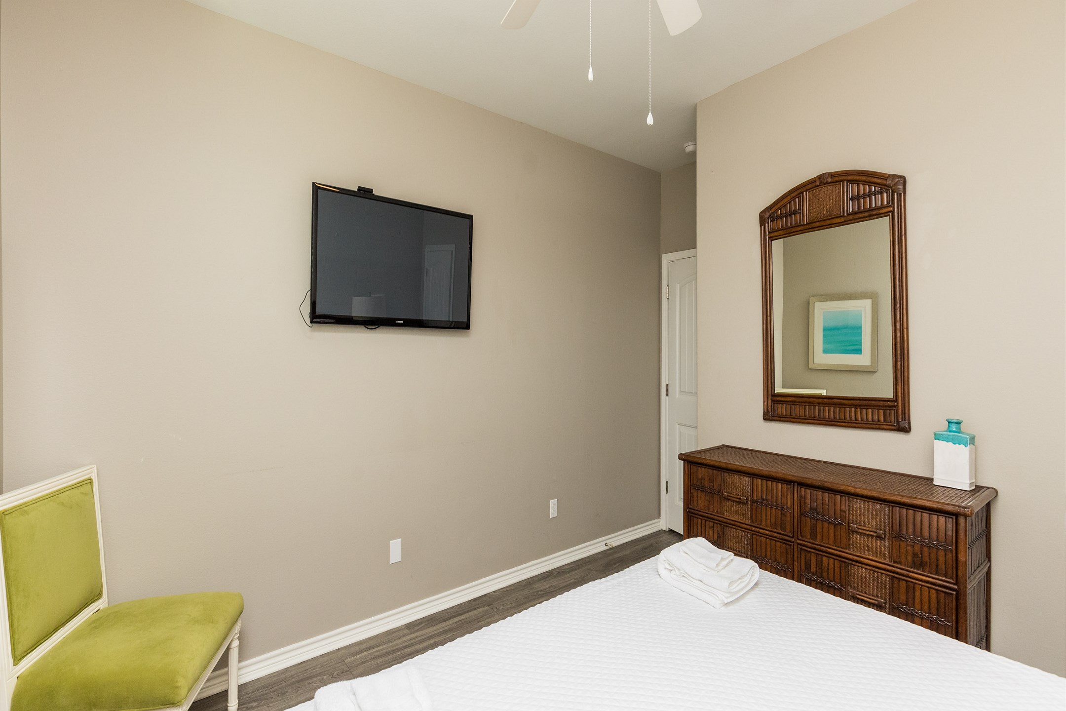 Second bedroom on the second floor with king size bed and flat screen TV