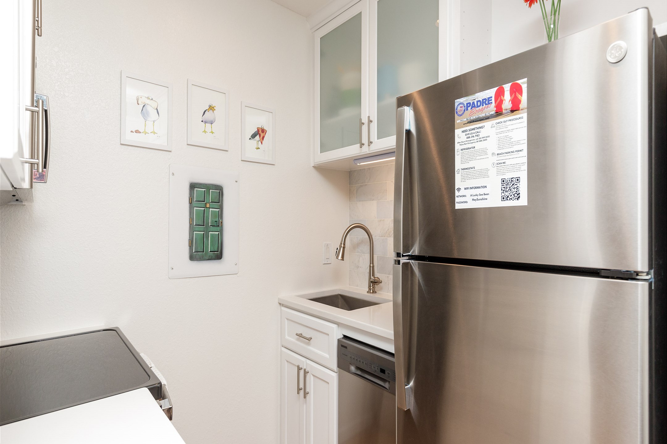 Kitchen is newly remodeled with cabinets, counter tops and stainless steel appliances 