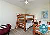 Third bedroom on the second floor with full size bunk beds, twin bed and twin size futon