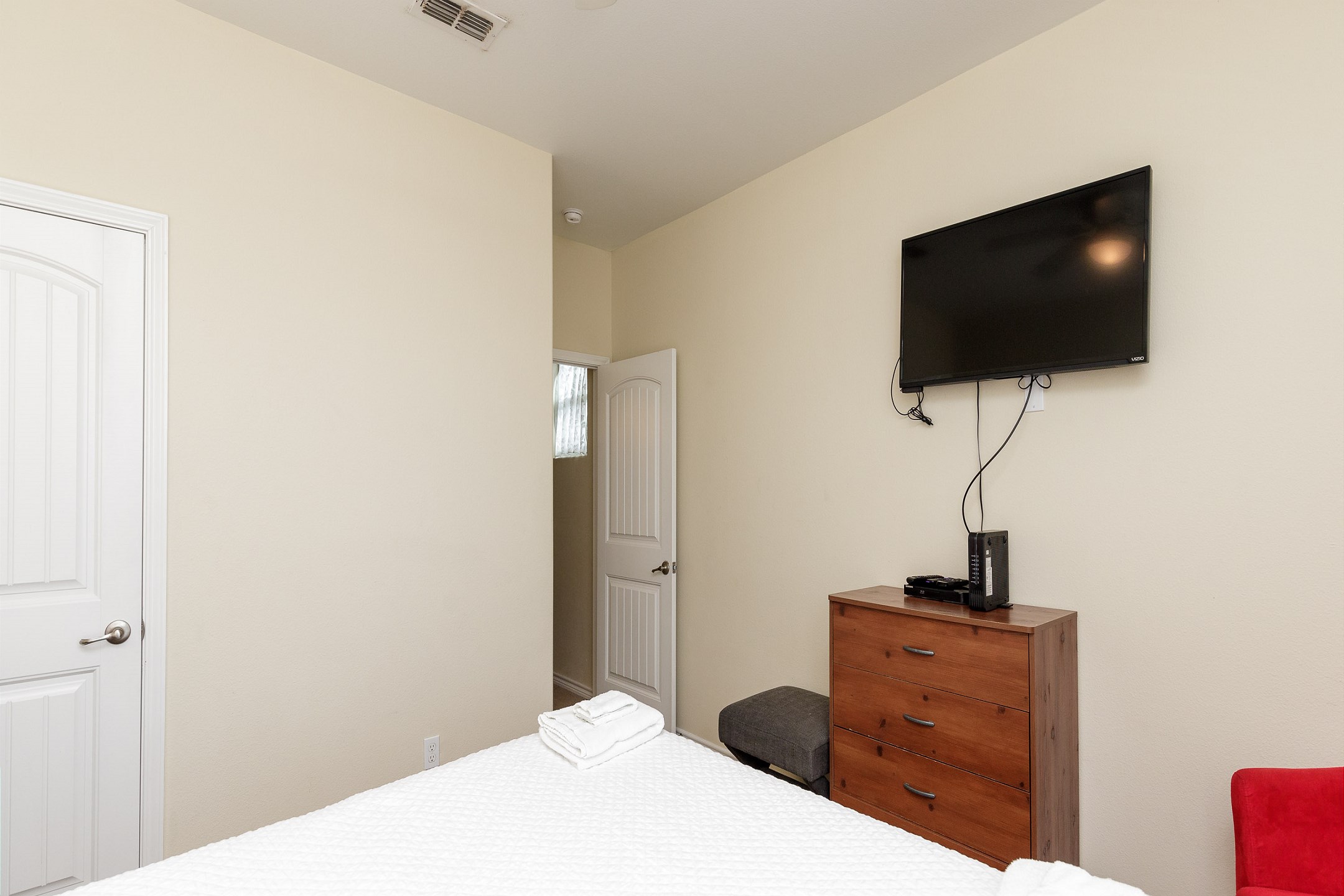 Second bedroom on the second floor with queen size bed and flat screen TV
