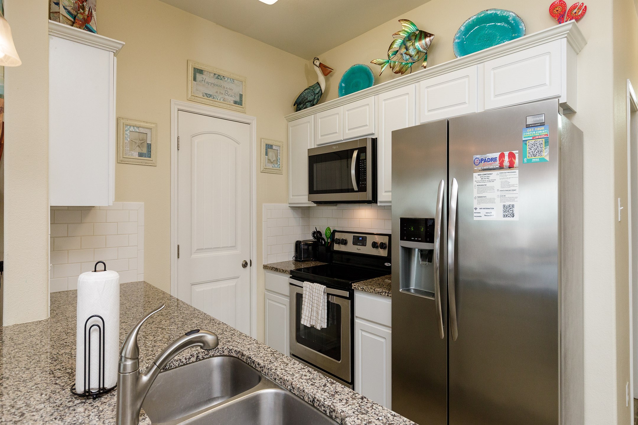 Well equipped kitchen with stainless steel appliances 