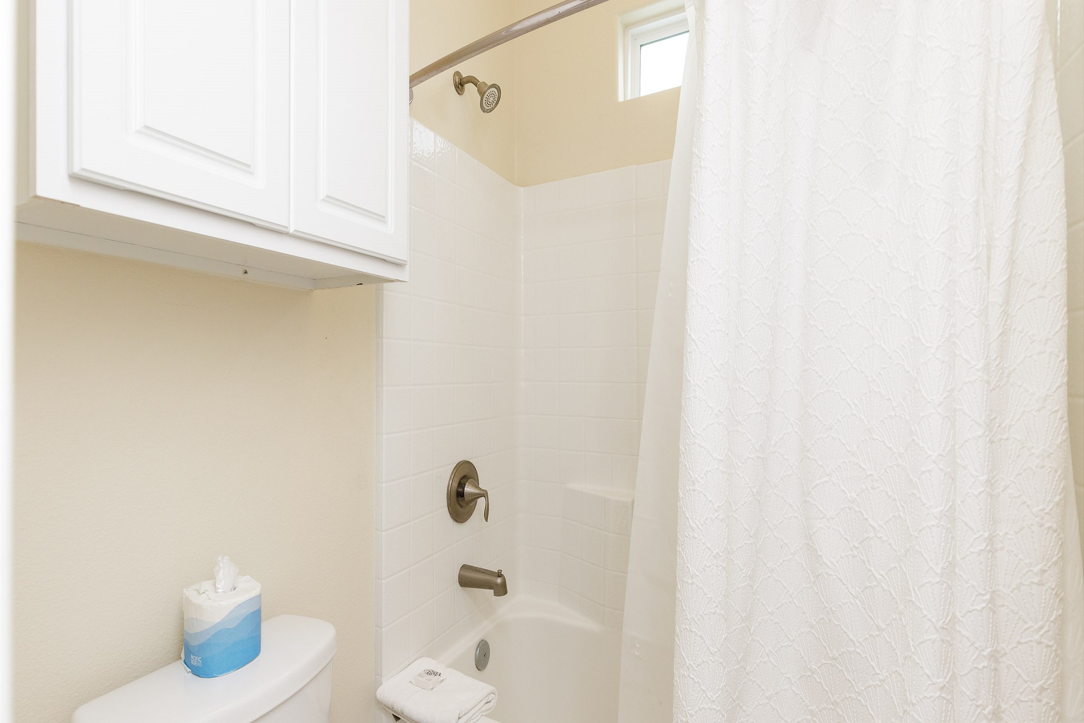 Guest bathroom on the second floor with tub and shower 
