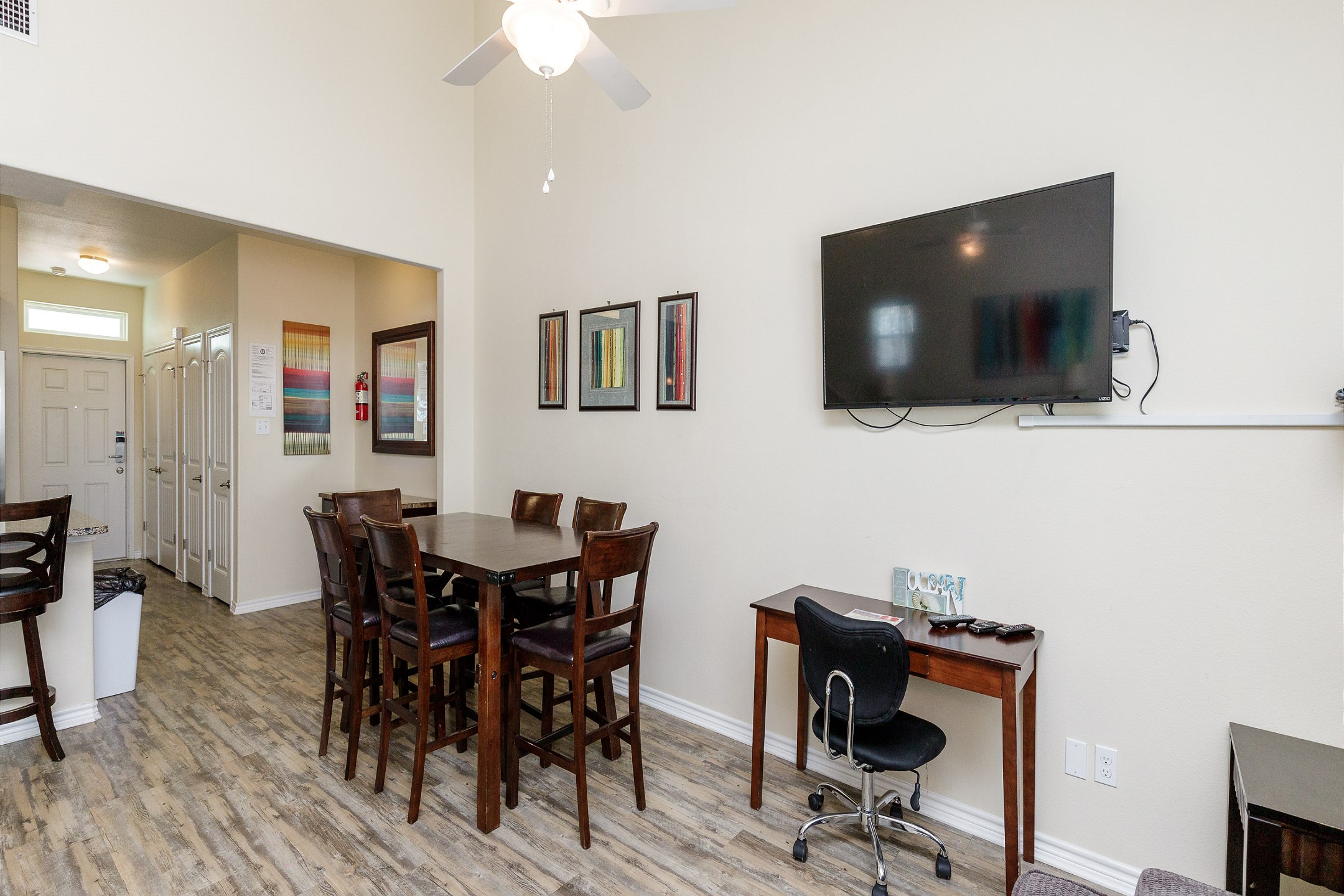 Living area with a flat-screen TV and a convenient workstation