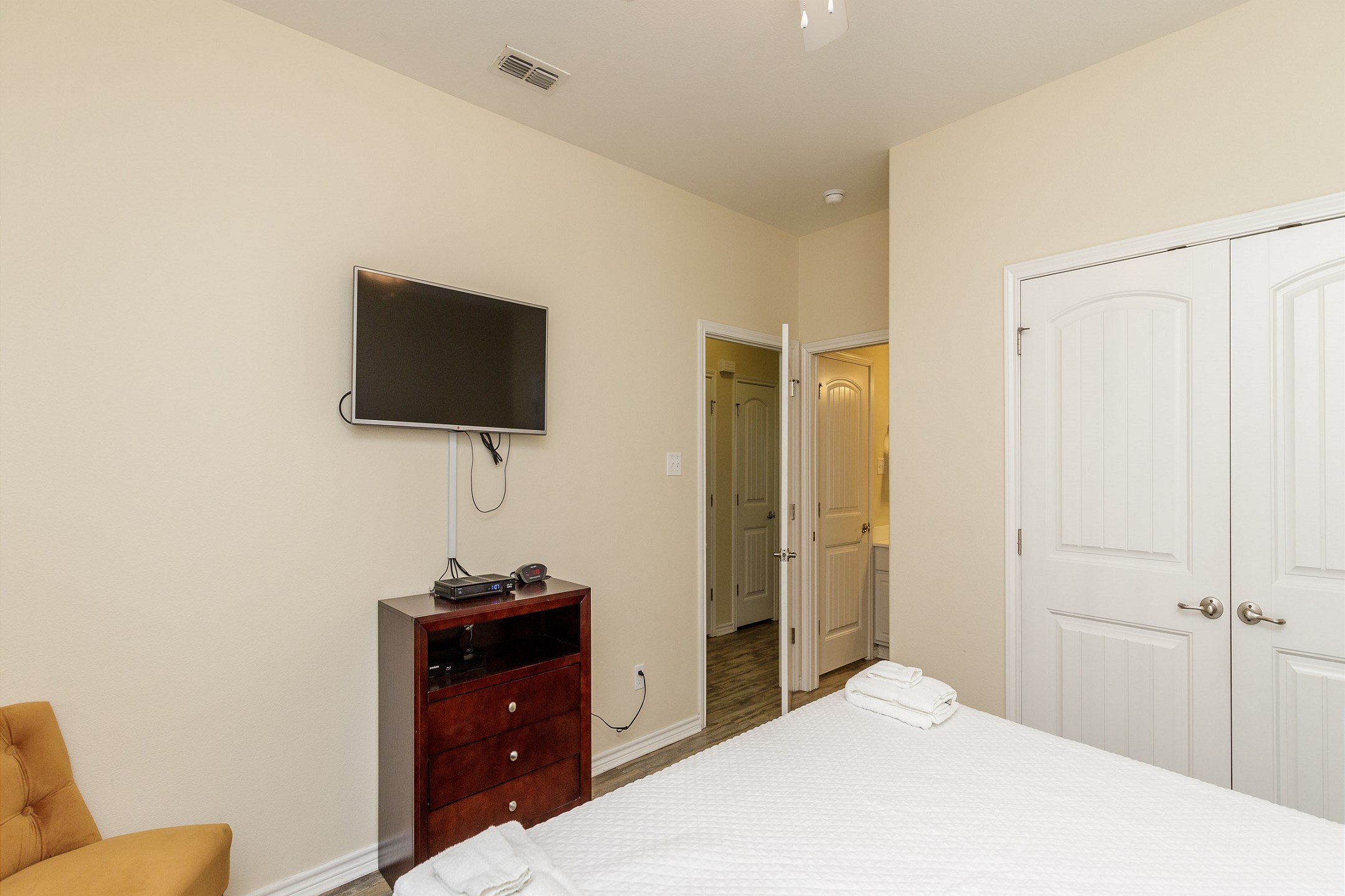 Master bedroom on the first floor with king size bed and flat screen TV 