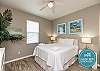 Second bedroom on the second floor with queen size bed