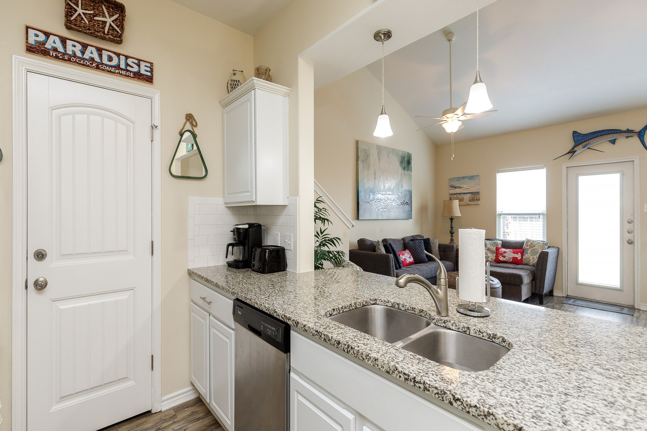 Great kitchen area with coffee maker, toaster, and other essentials provided