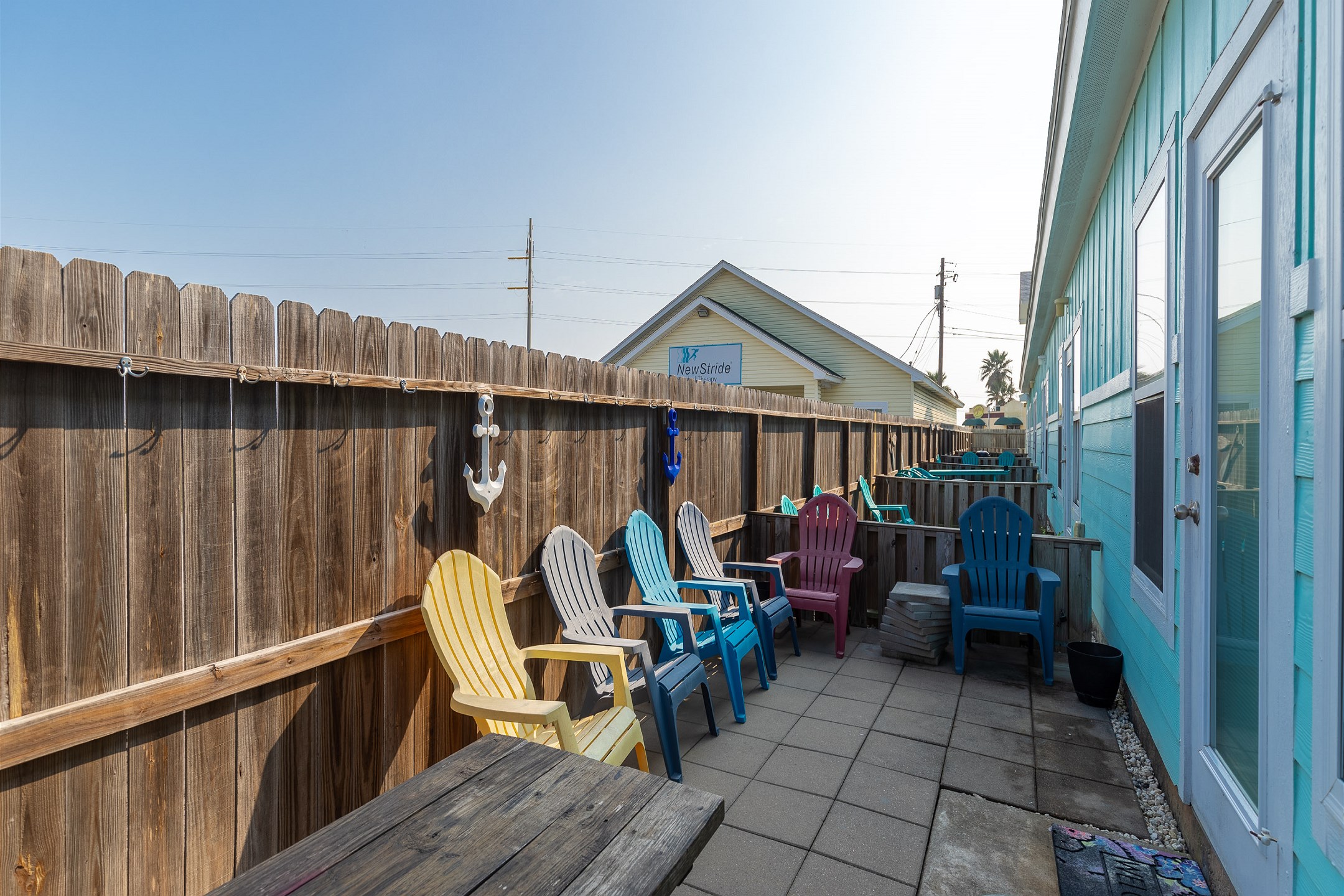 Private patio area with plenty of seating to spend time with the family plus bonus space for your beach equipment 