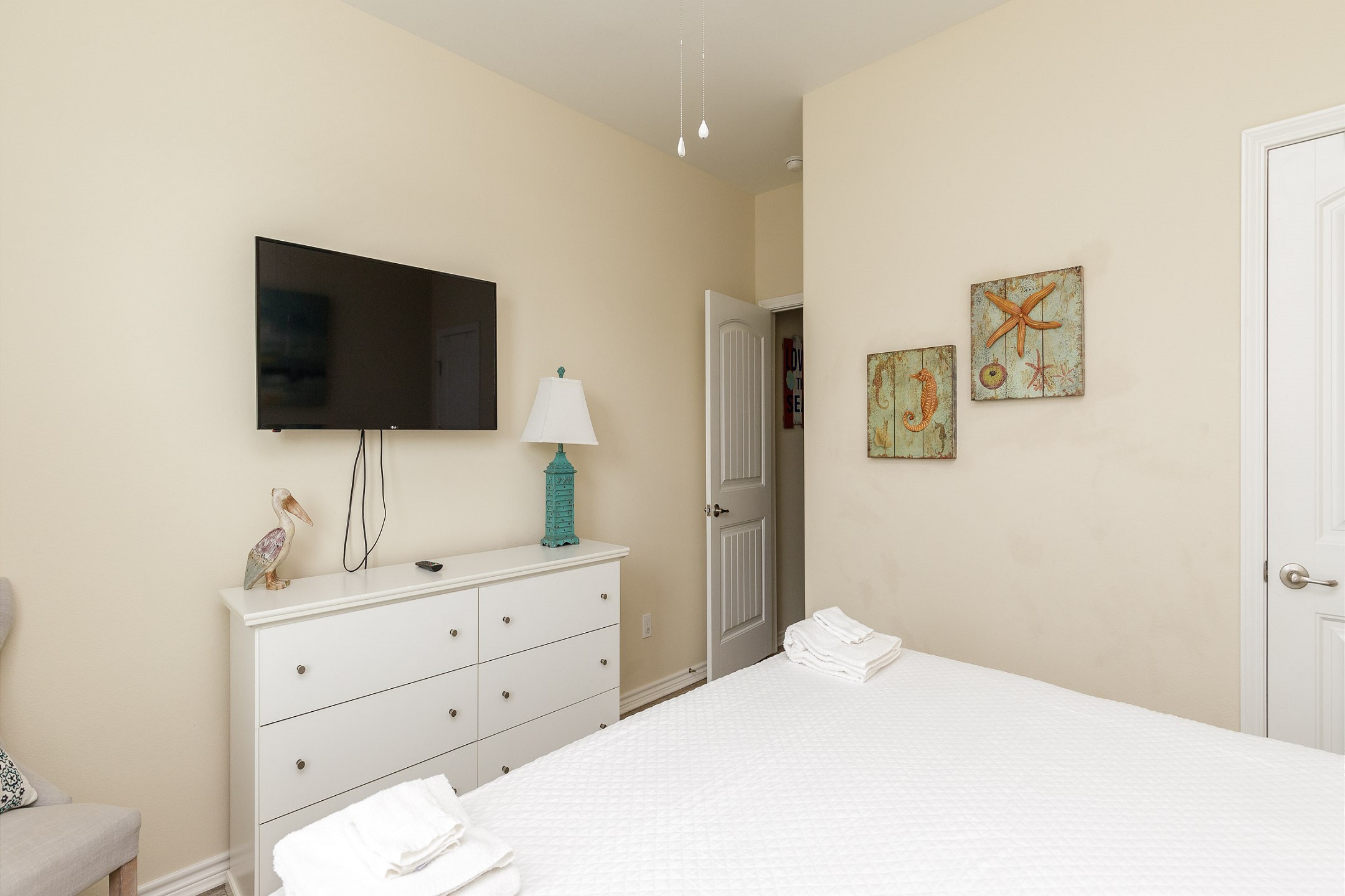 Second bedroom on the second floor with king size bed and flat screen TV