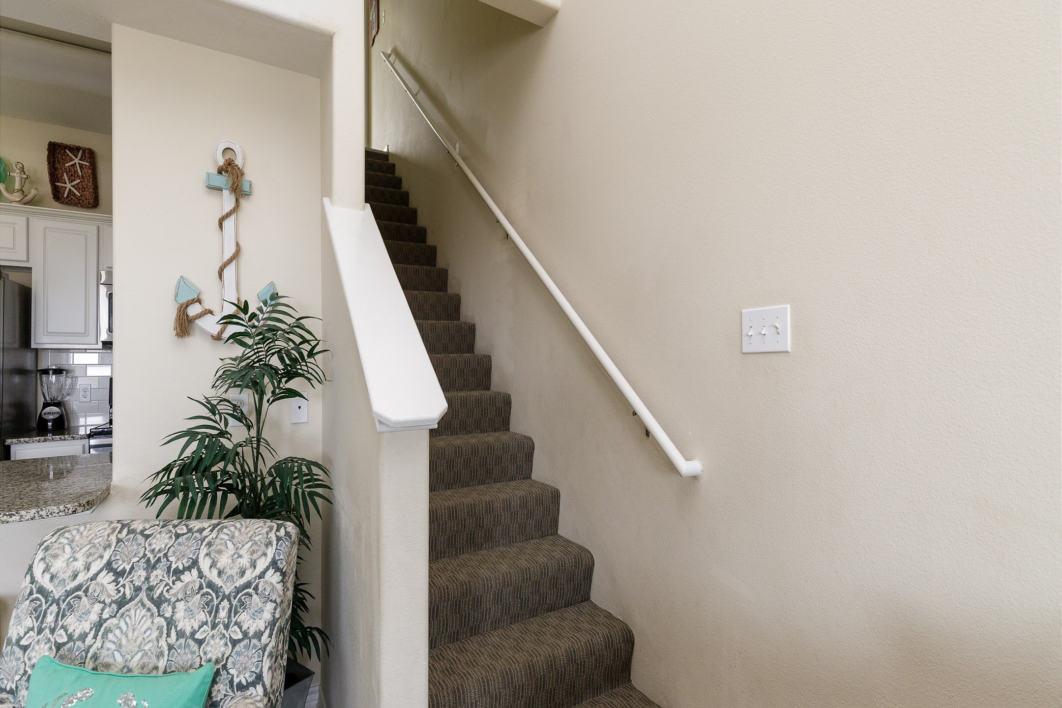 Stairs leading to the second floor bedrooms 