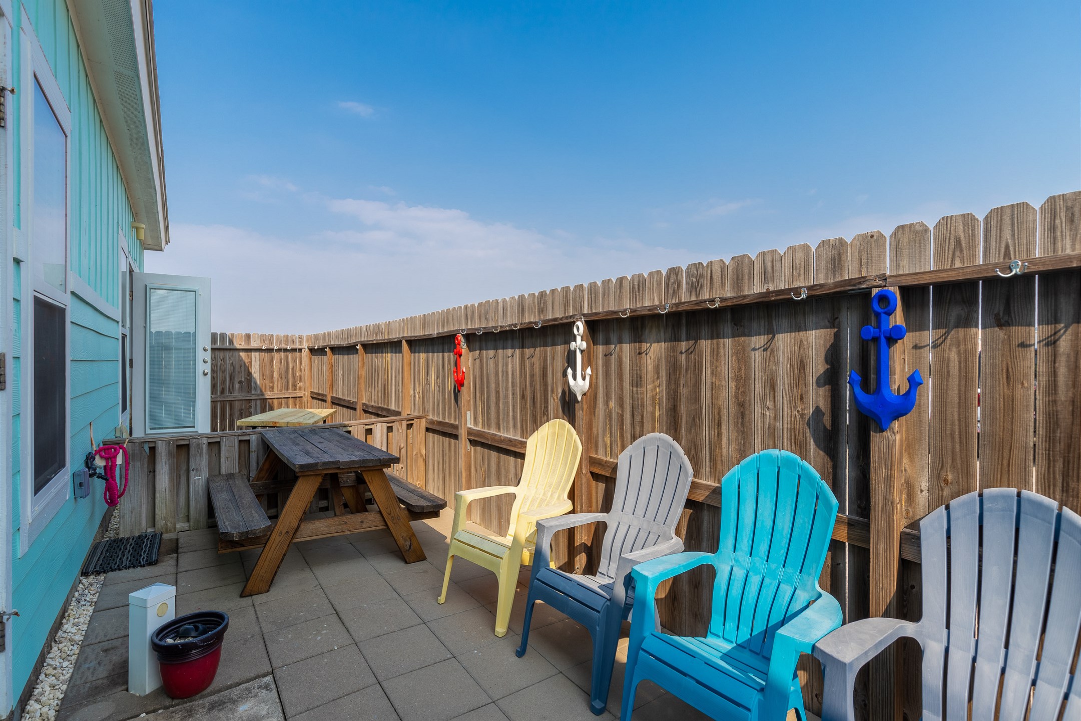 Private patio with picnic table and chairs, perfect for creating lasting memories with loved ones