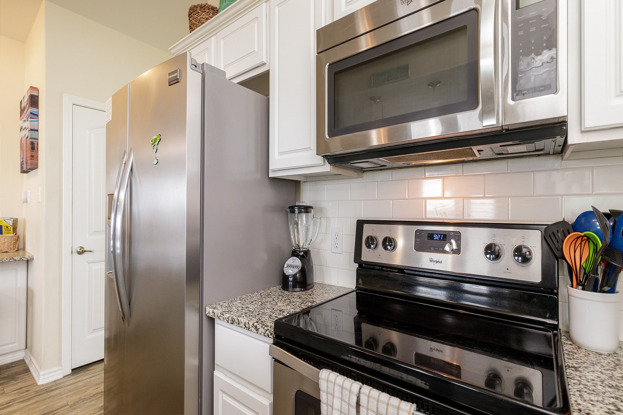 Fully equipped kitchen with stainless steel appliances 