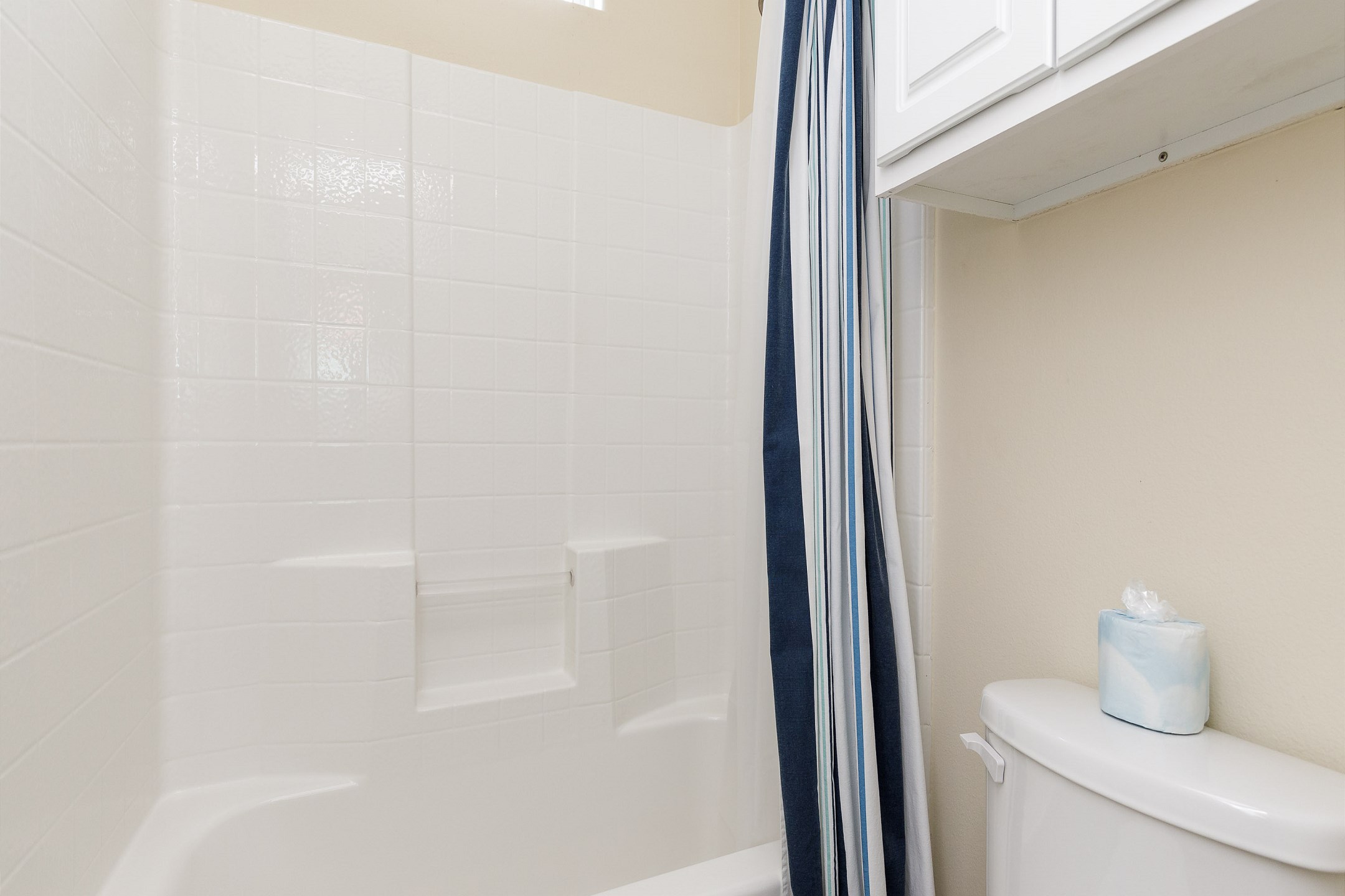 Guest bathroom on the second floor with tub and shower 
