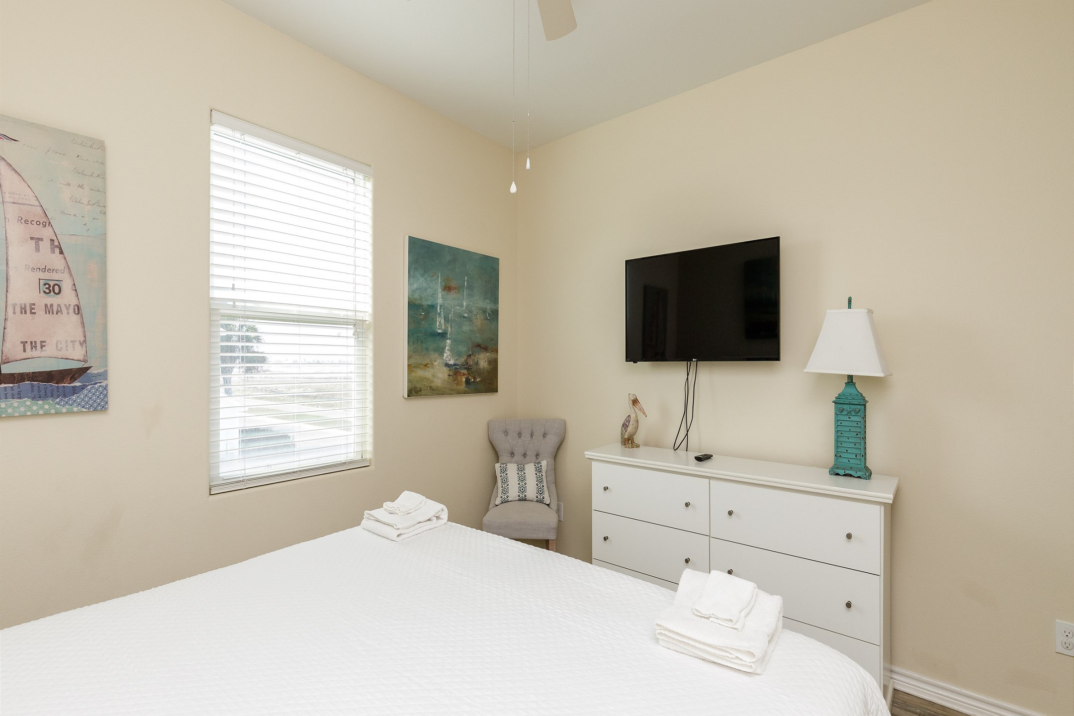 Second bedroom on the second floor with king size bed and flat screen TV